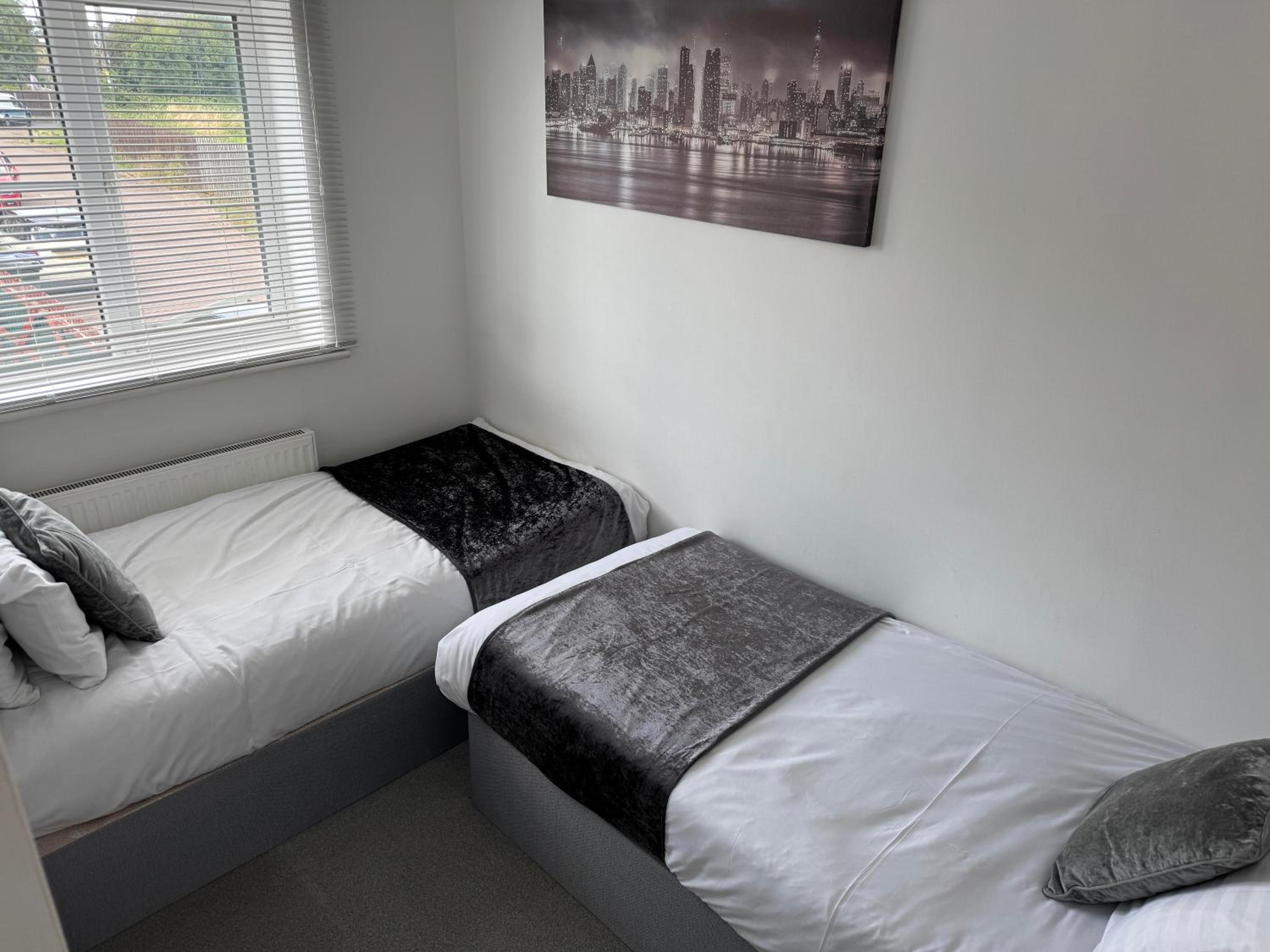 Three-Bedroom Apartment - Photo 45