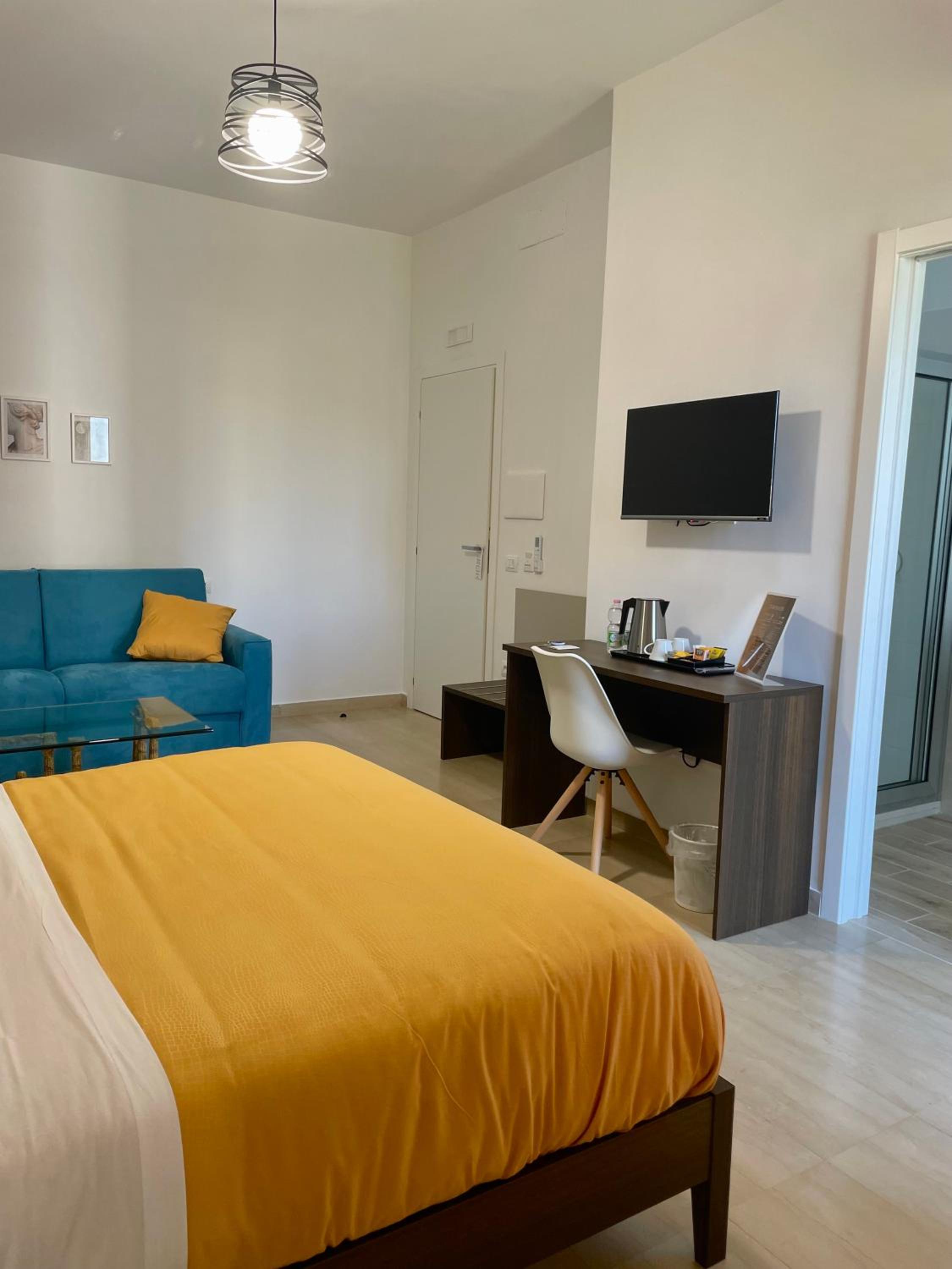 Deluxe Quadruple Room - Photo 16