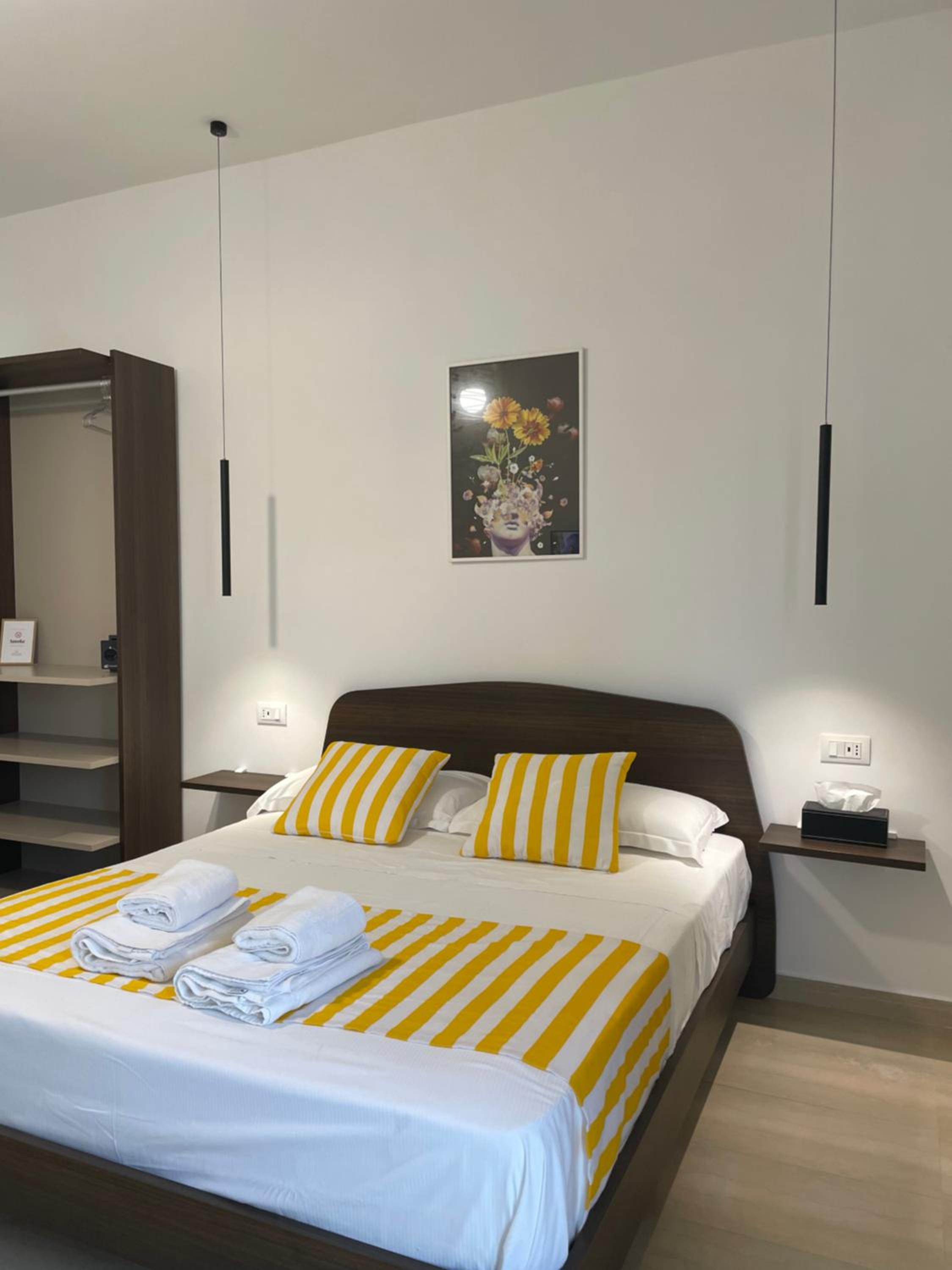 Deluxe Quadruple Room - Photo 15