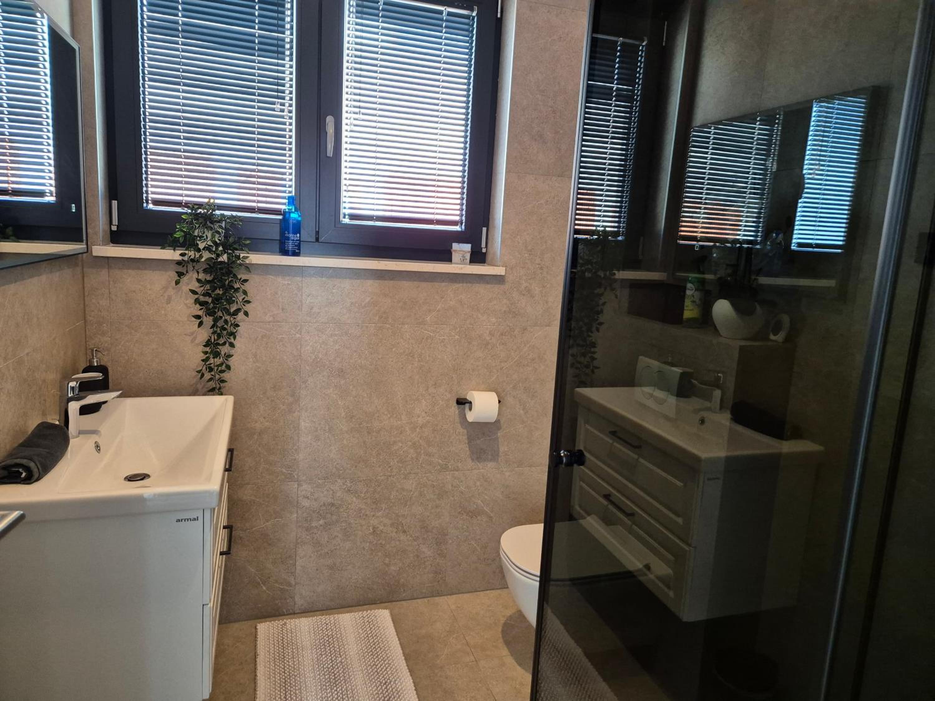 Three-Bedroom Apartment - Photo 10