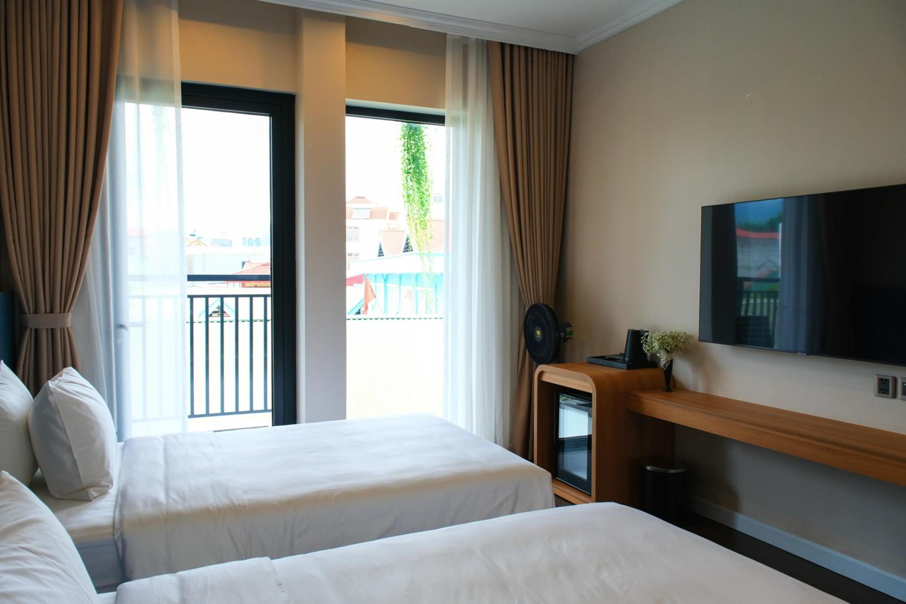 Standard Twin Room - Photo 4