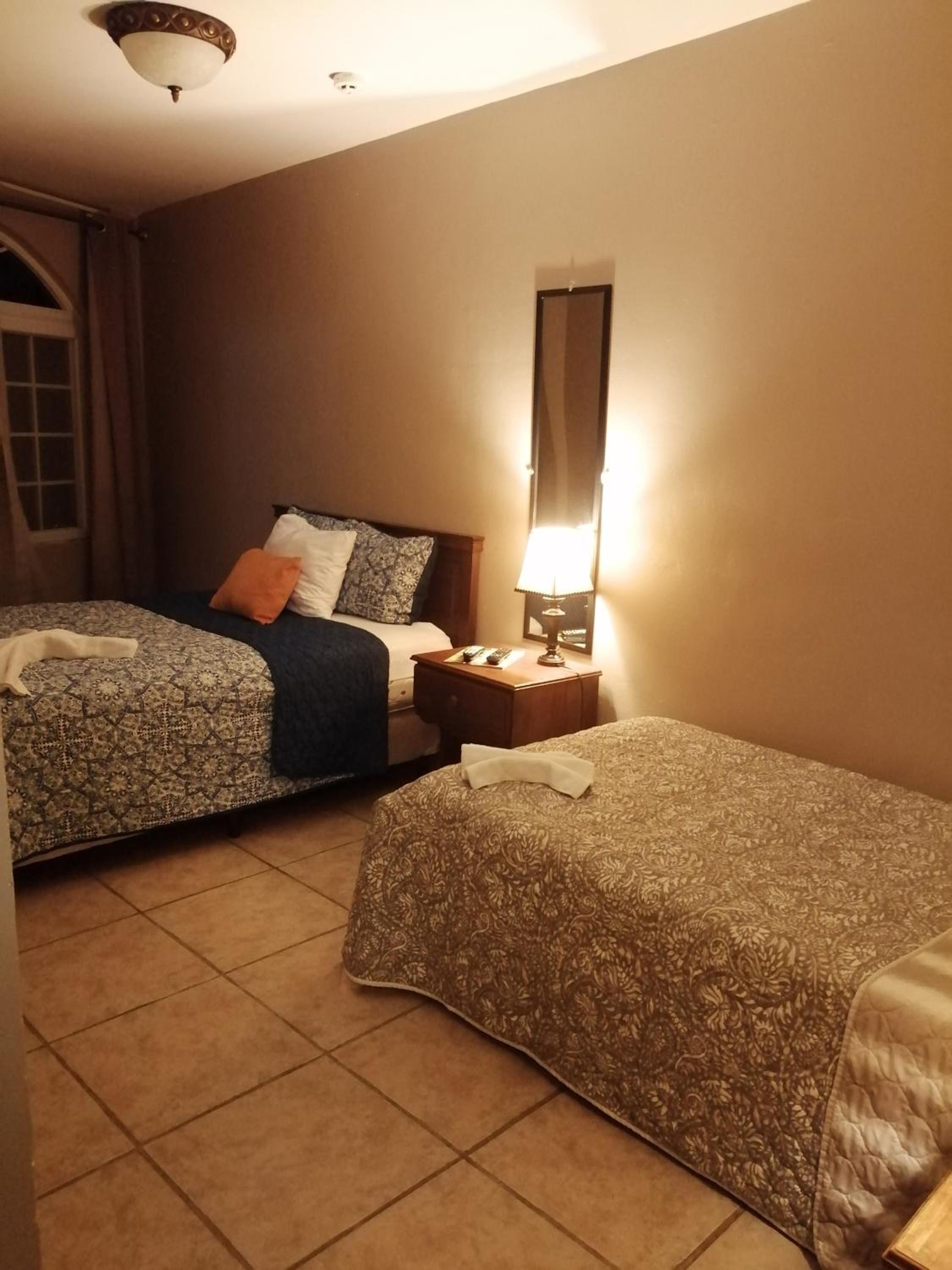 Double Room with Full Bed and Single Bed