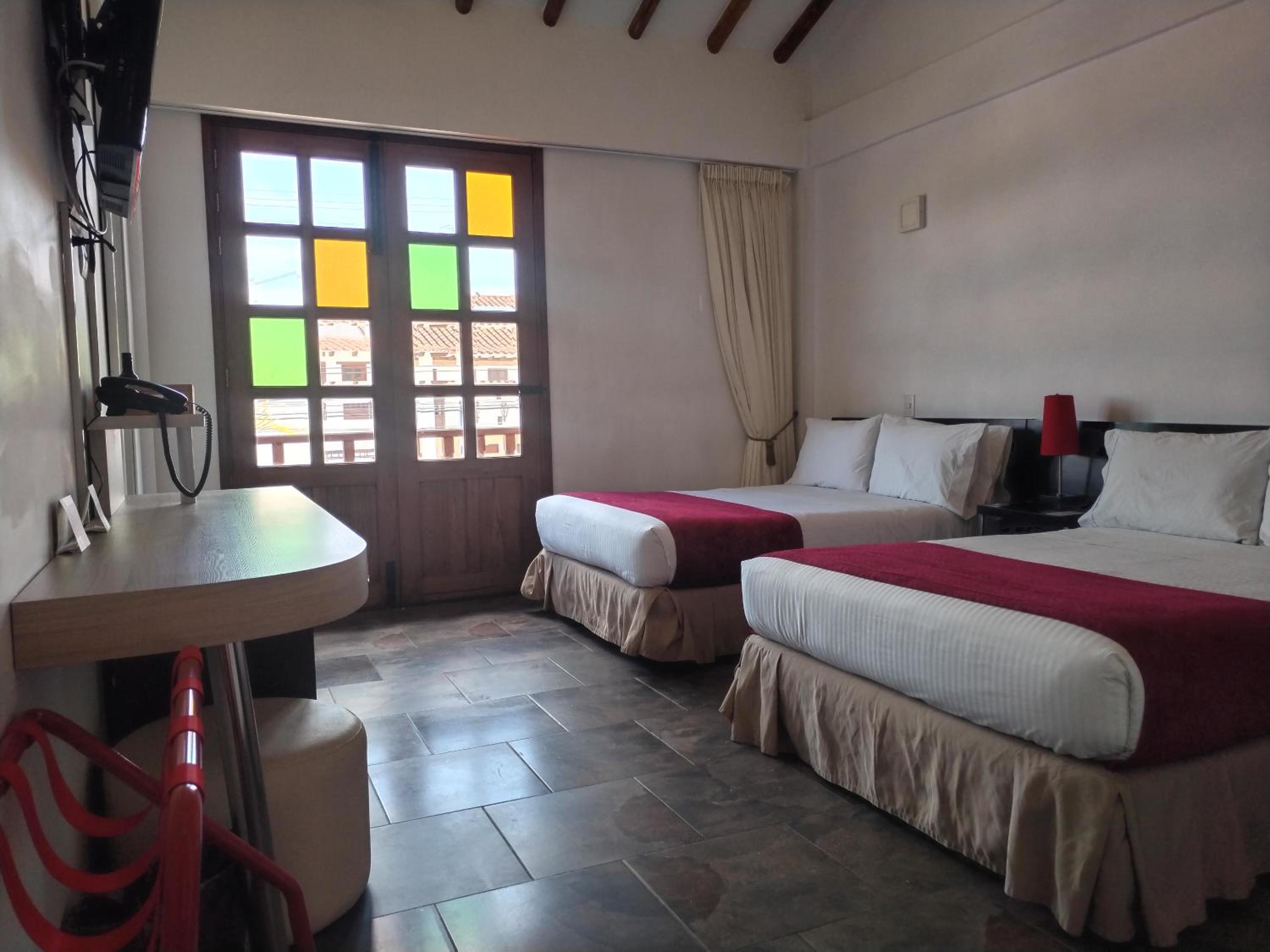 Quadruple Room with Balcony
