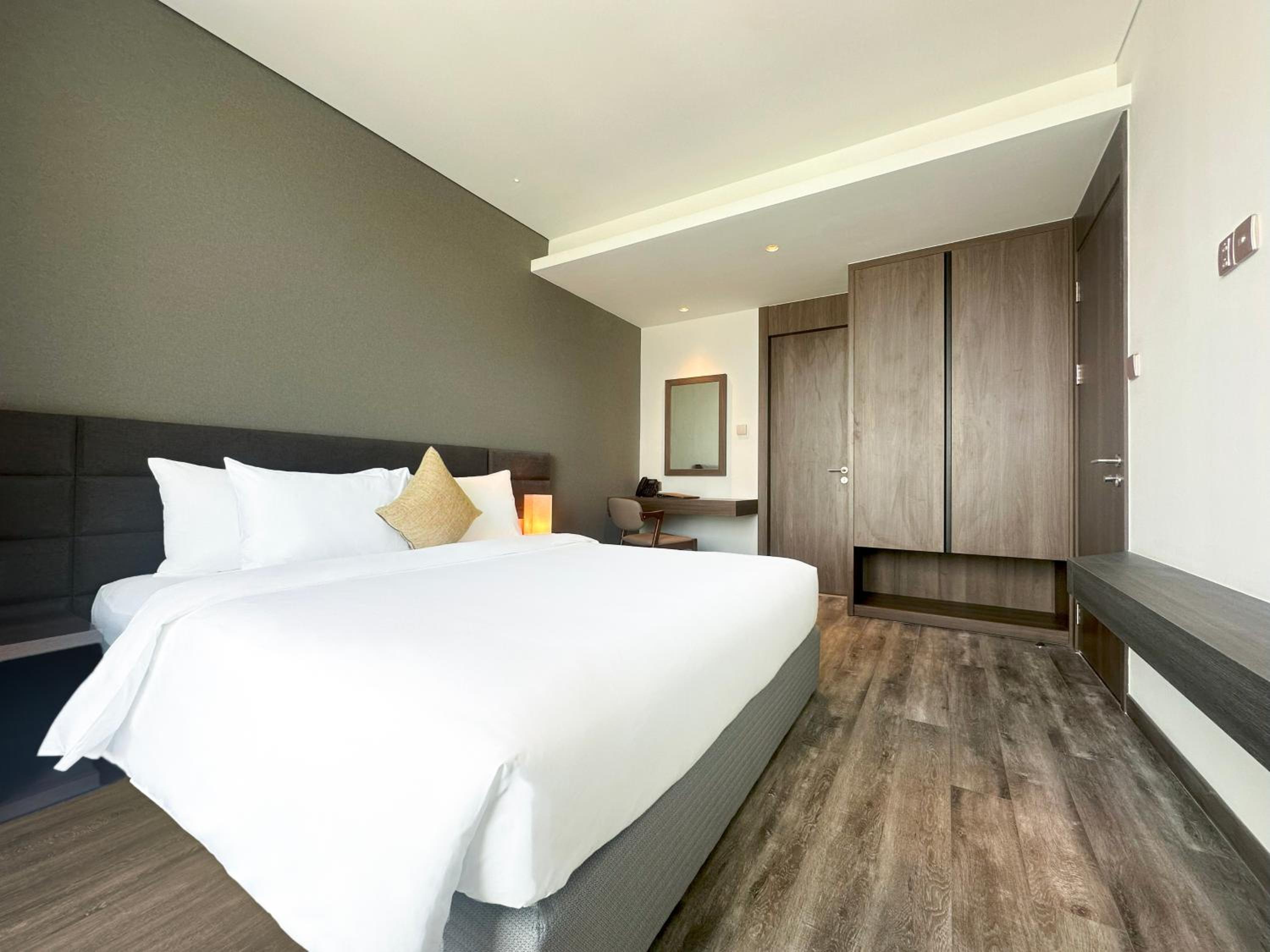 Three-Bedroom Apartment Suite - Photo 13