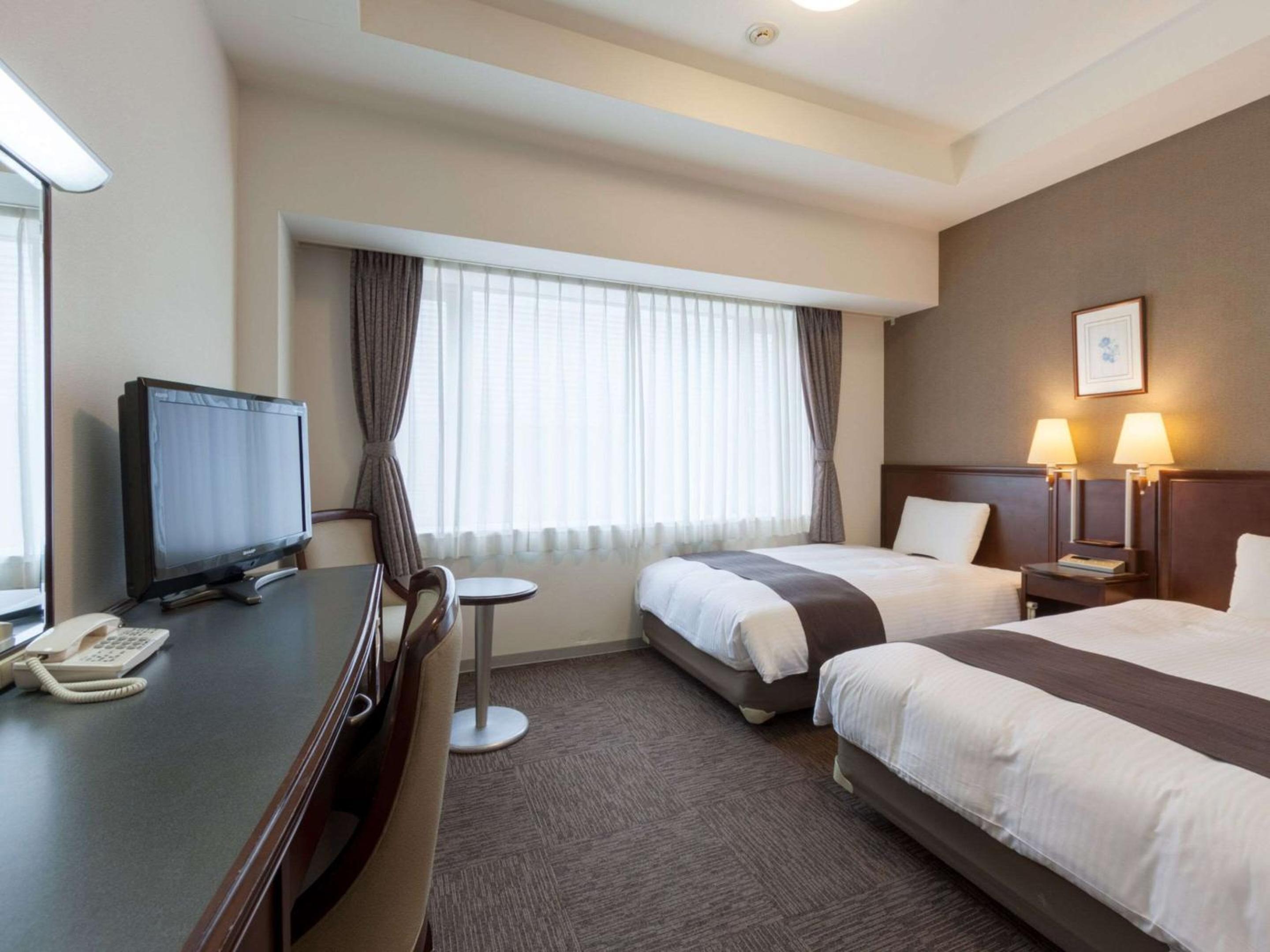 Twin Room - Non Smoking - Photo 1