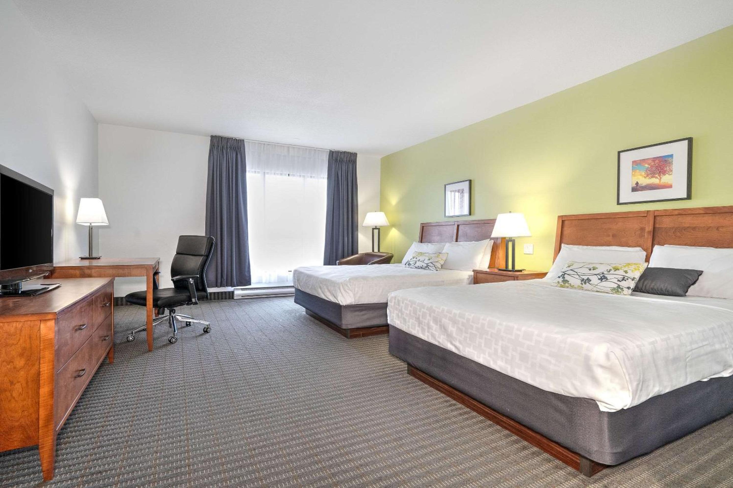 Standard Queen Room with Two Queen Beds - Non-Smoking photo 1