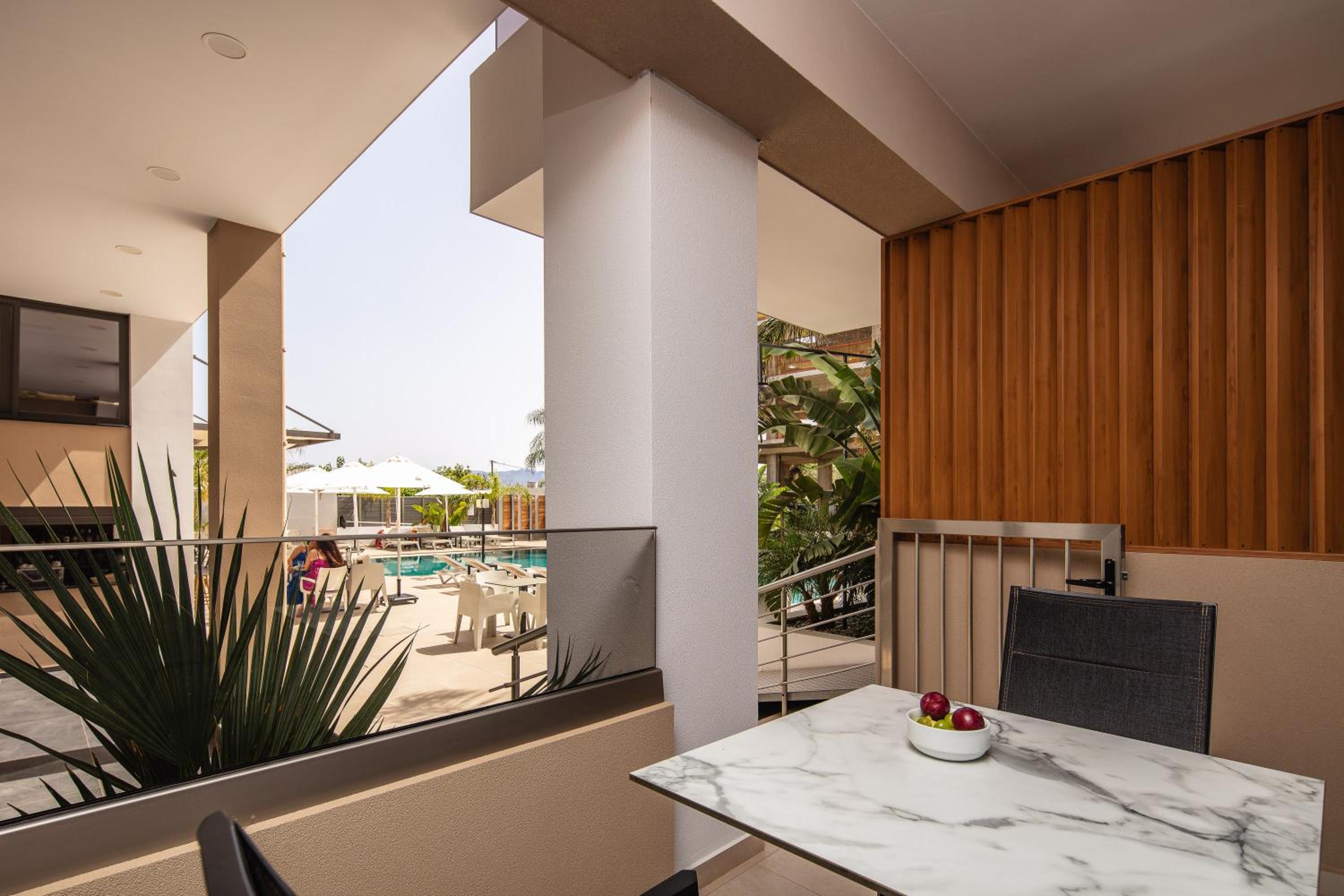 Superior Suite with Pool View - Photo 3