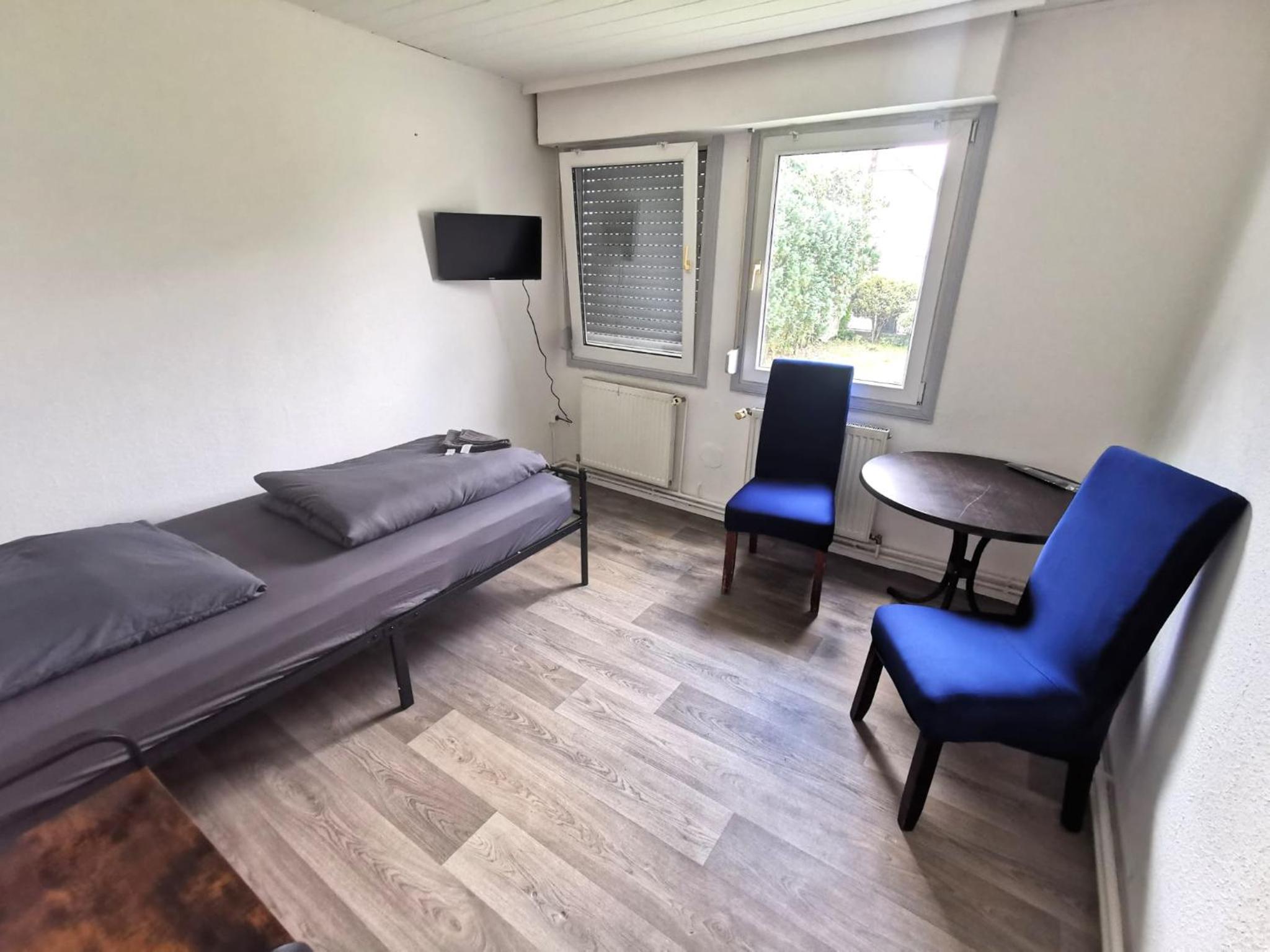 Three-Bedroom Apartment photo 1