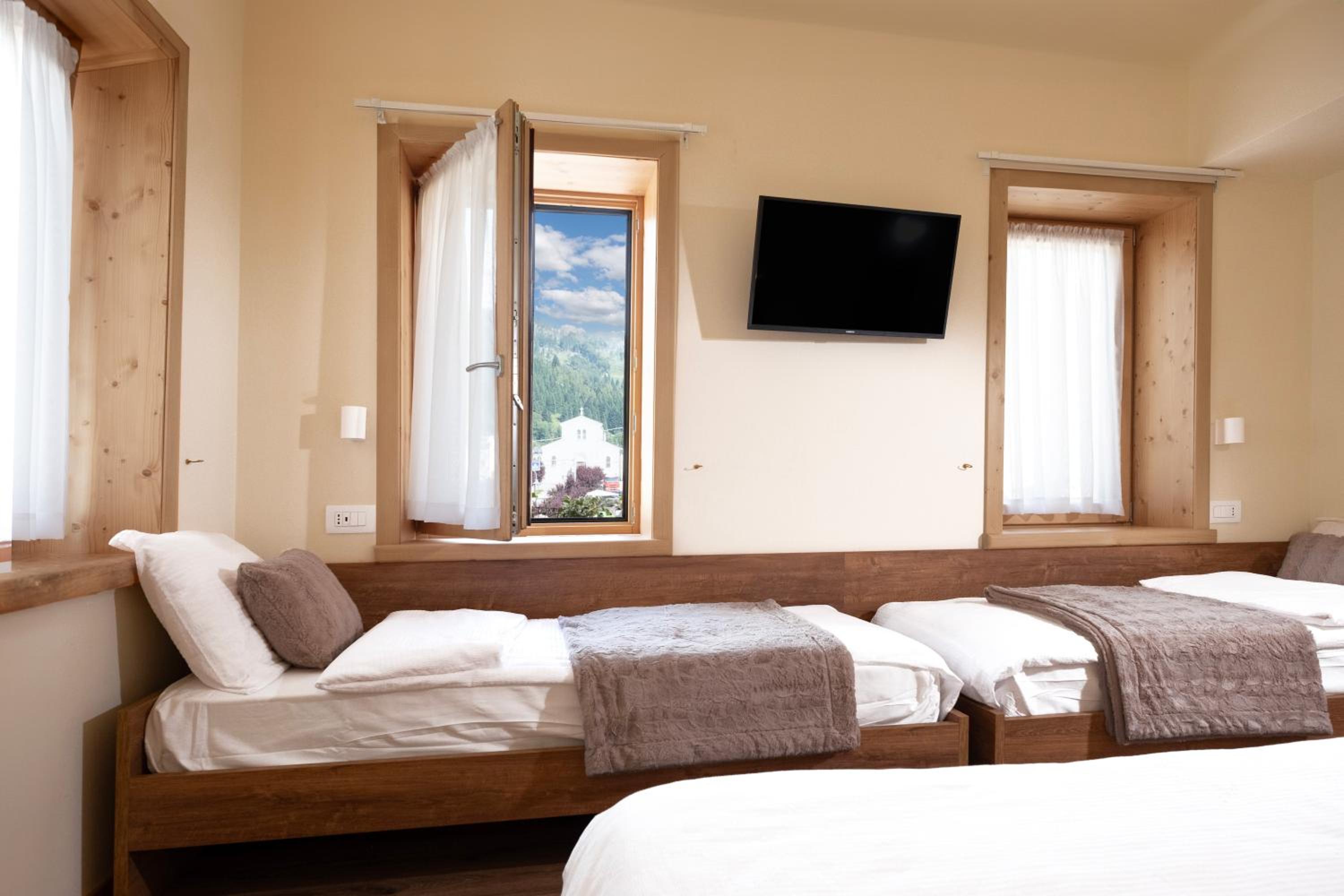 Deluxe Quadruple Room - Photo 15