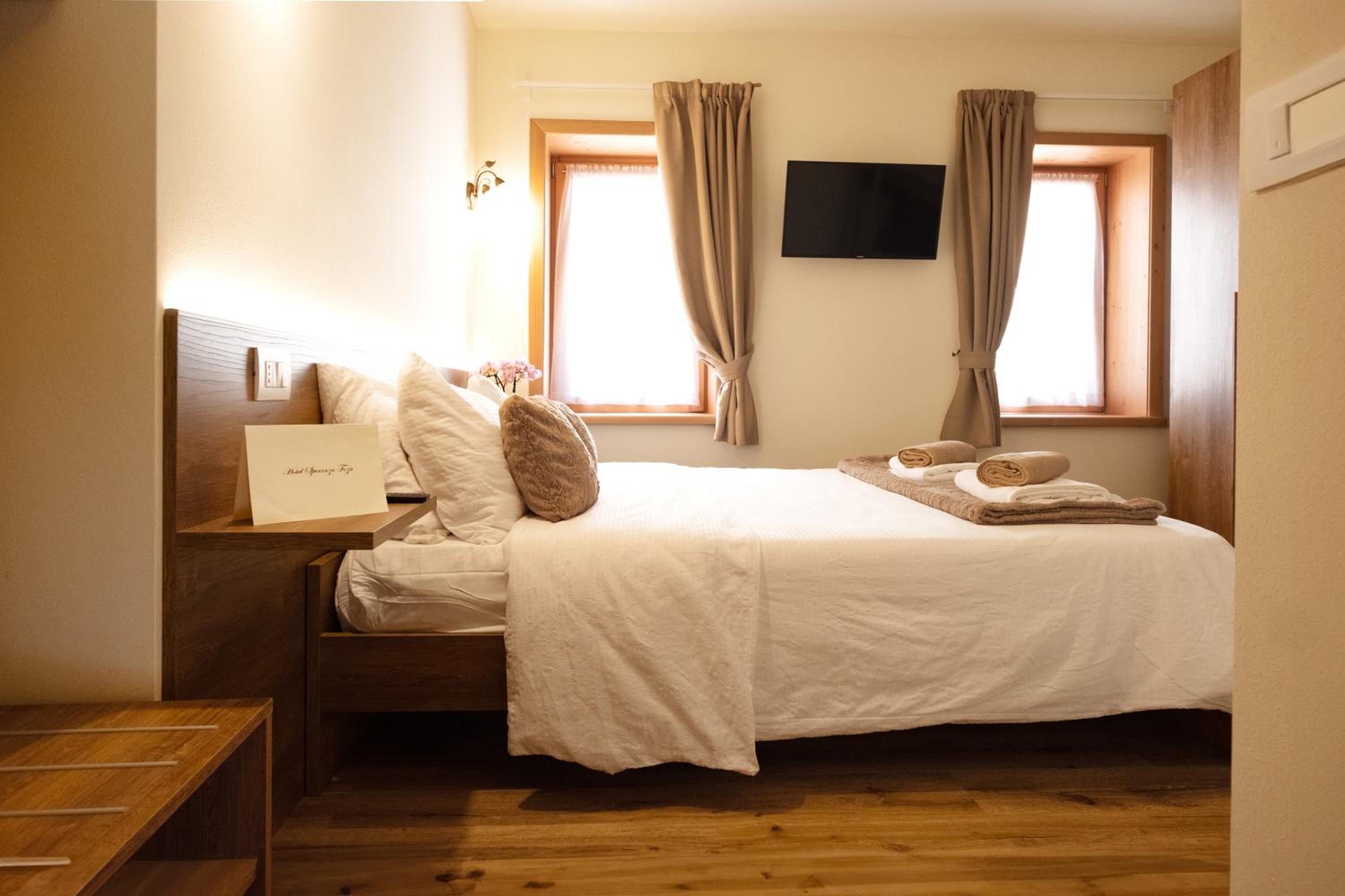 Deluxe Quadruple Room - Photo 6