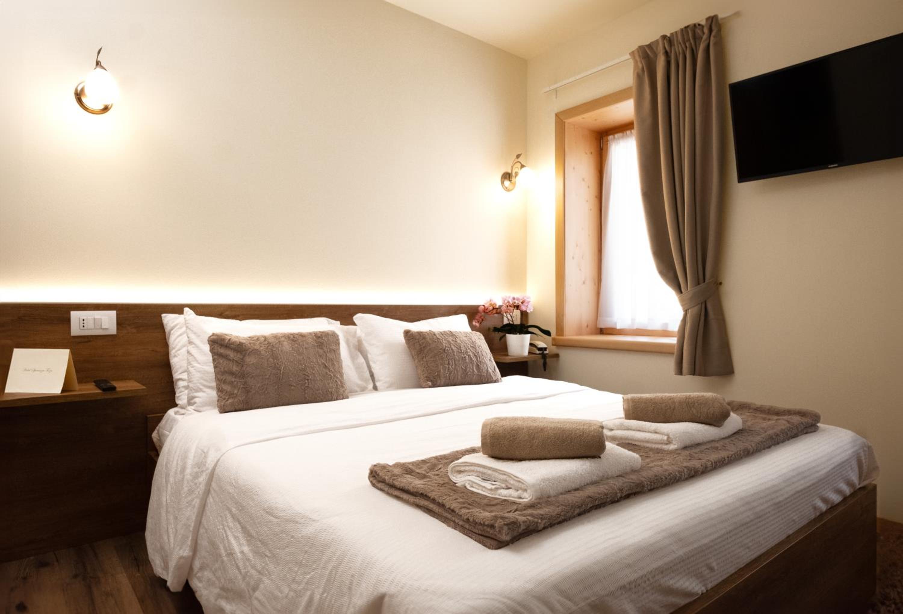 Deluxe Quadruple Room - Photo 10