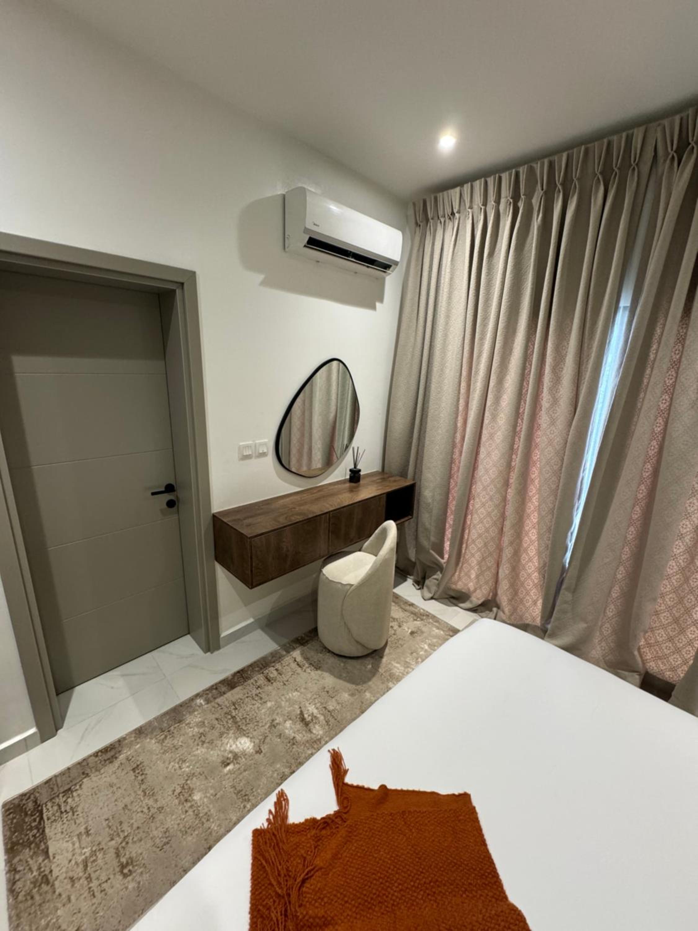 Three-Bedroom Apartment photo 2