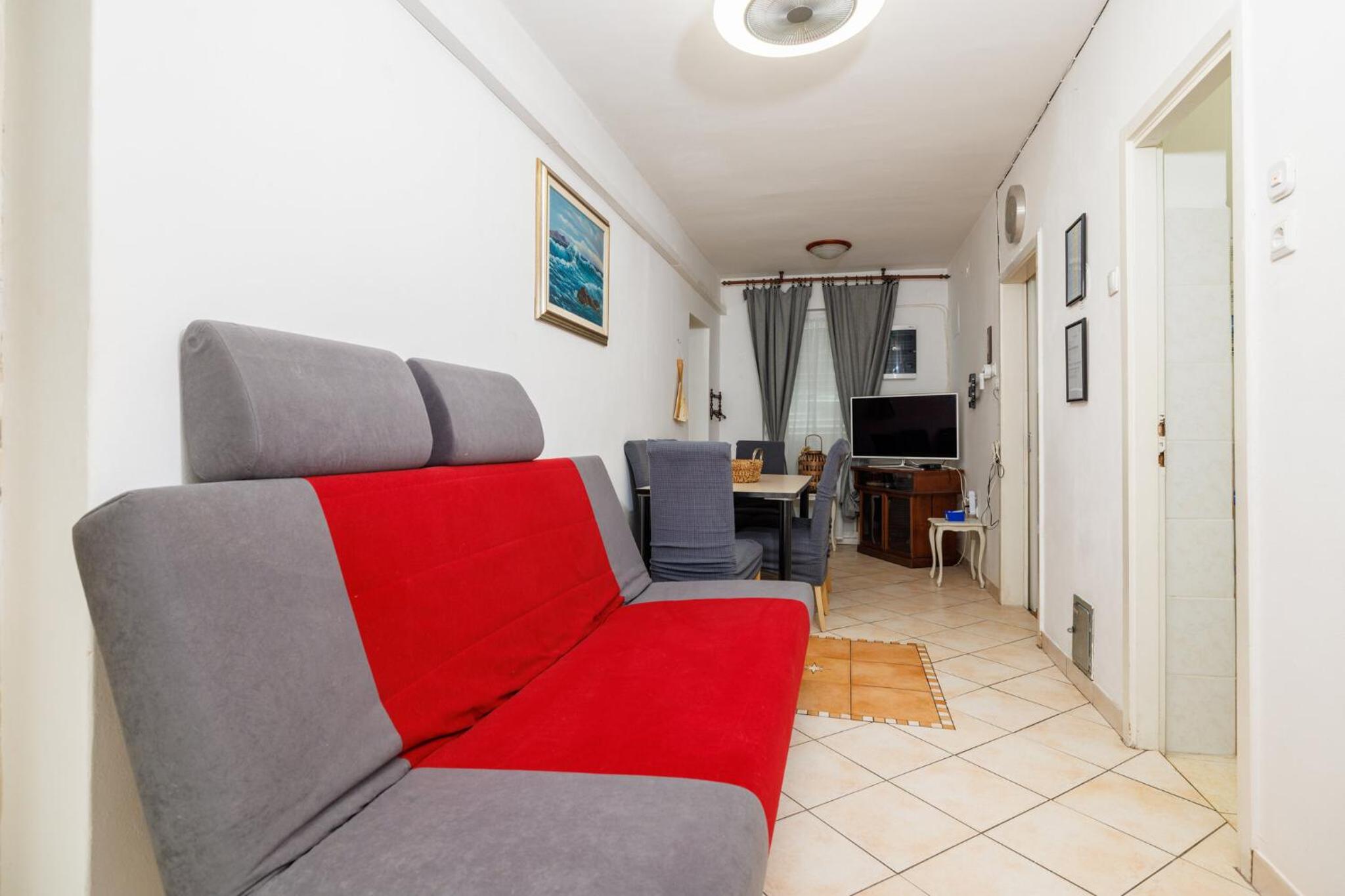 Four-Bedroom Apartment with Balcony 