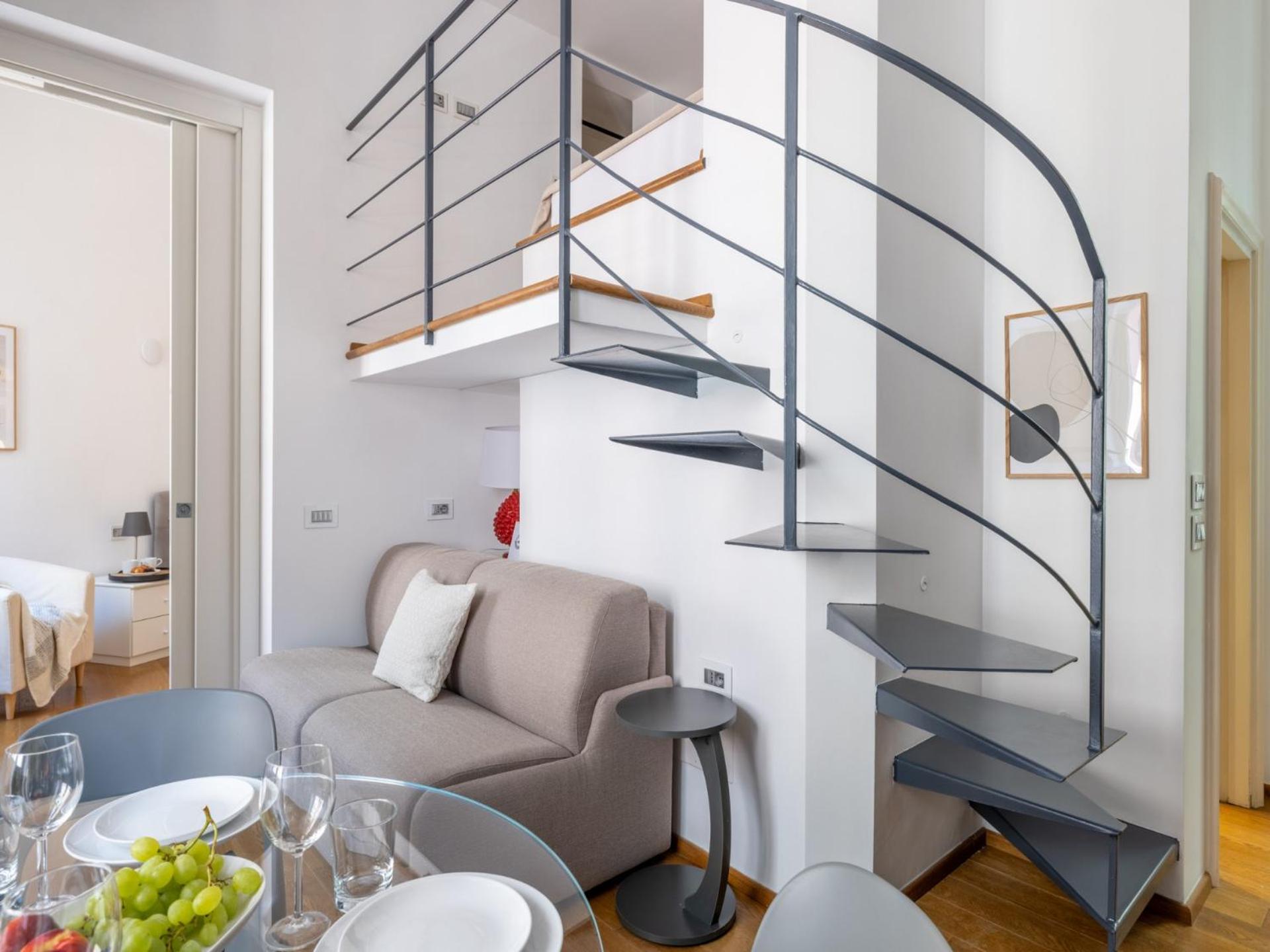 One-bedroom apartment with a mezzanine with a double bed
