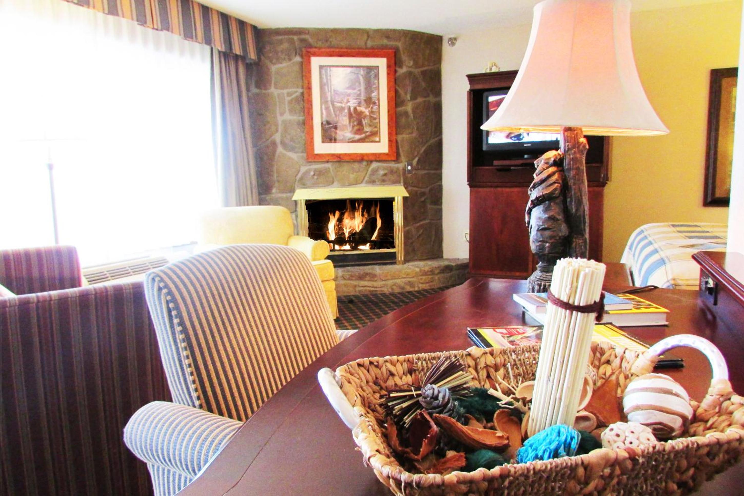 Junior Suite with King Bed, Sofa Bed, Fireplace, Two Vanities, Jet Tub and Share