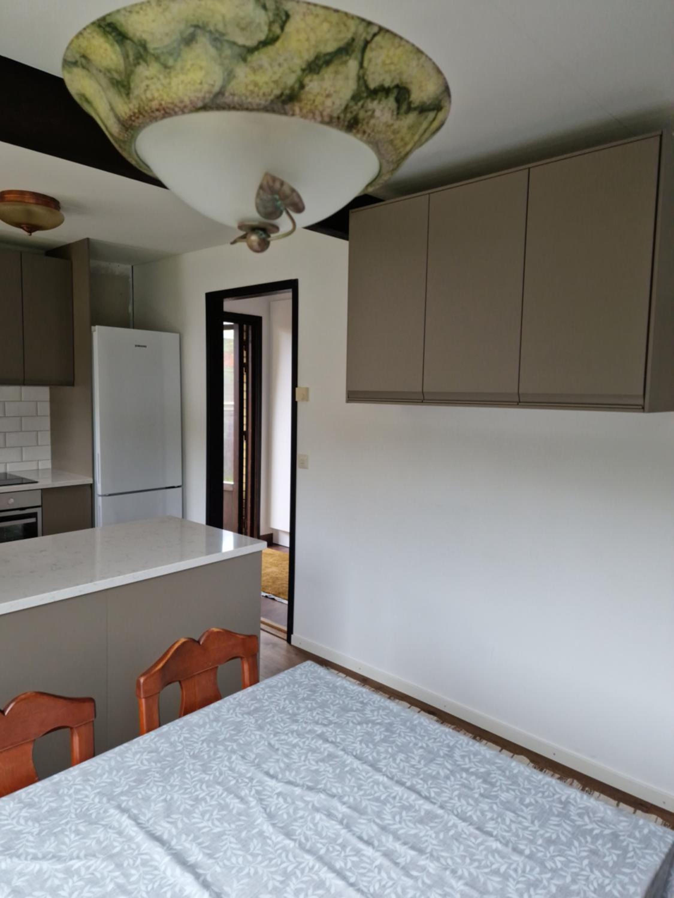Three-Bedroom House - Photo 35