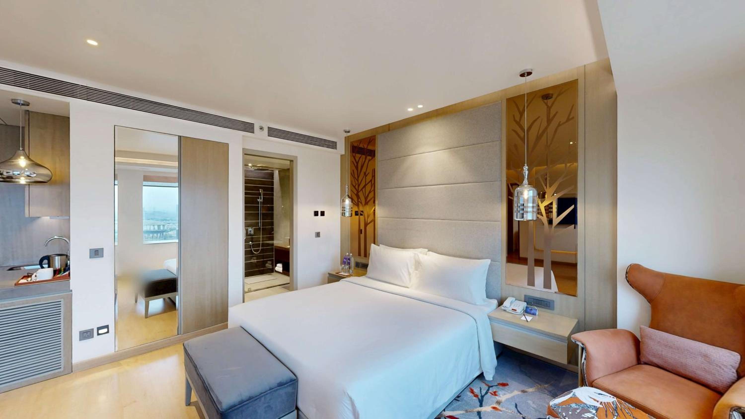 Executive Suite – Unlimited pour during happy hours between 6 to 8 pm in room, fruit bowl, 2 varieties of home-made cookies, assorted dry nuts, 6 pcs laundry complimentary per suite per day, 24 hrs butler service photo