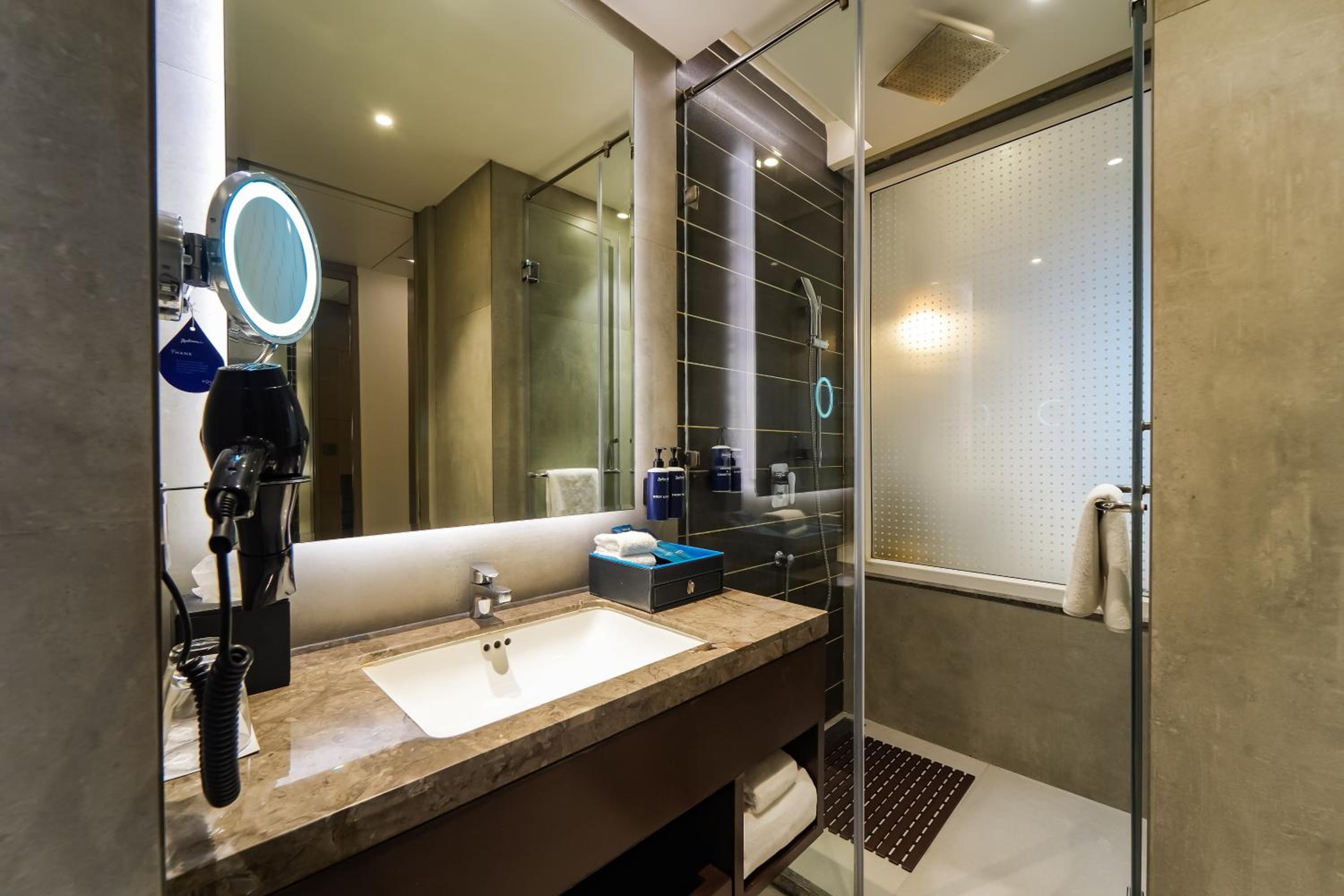 Executive Suite - Unlimited pour during happy hours between 6 to 8 pm in room, fruit bowl, 2 varieties of home-made cookies, assorted dry nuts, 6 pcs laundry complimentary per suite per day, 24 hrs butler service