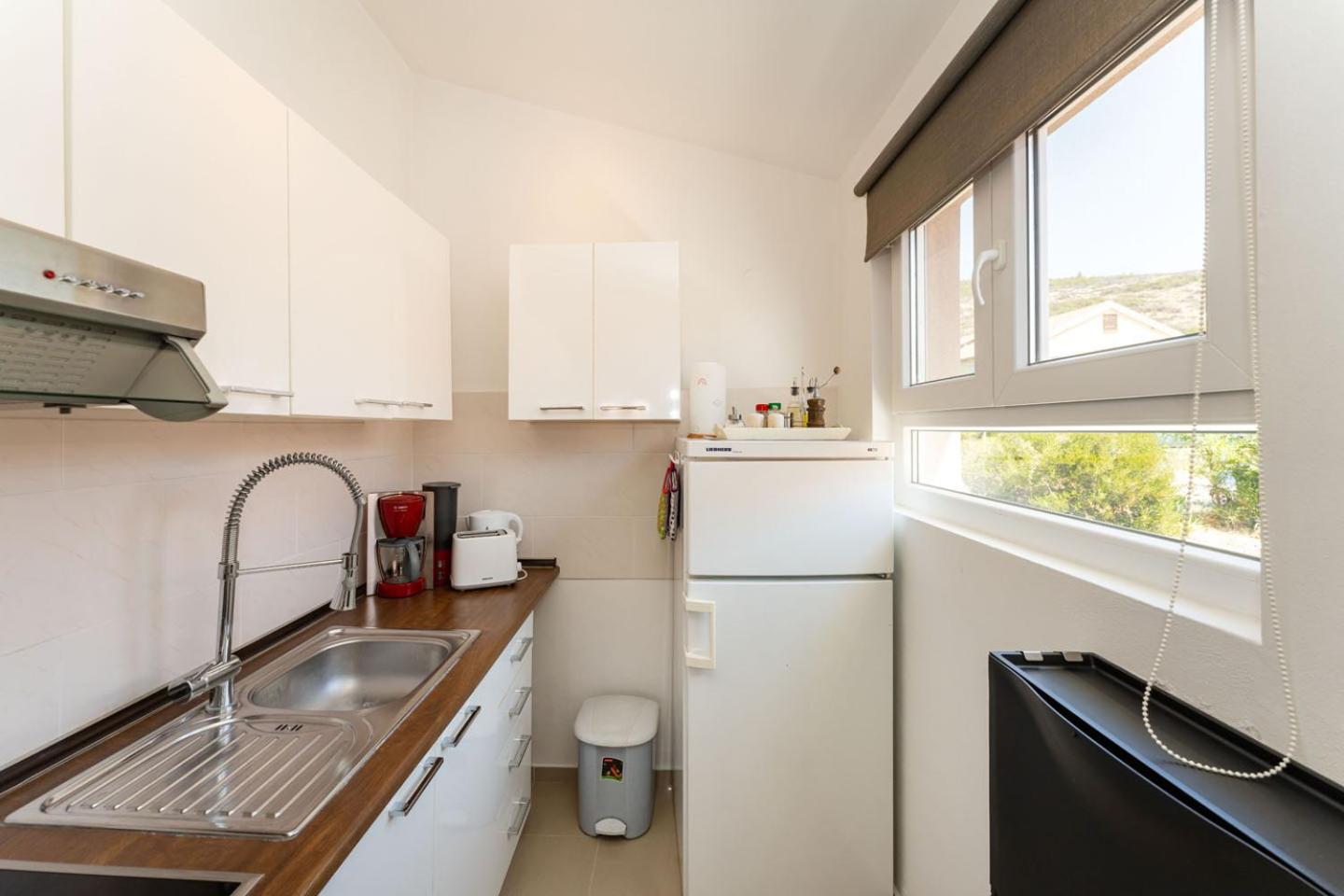 Two-Bedroom Apartment - Photo 36