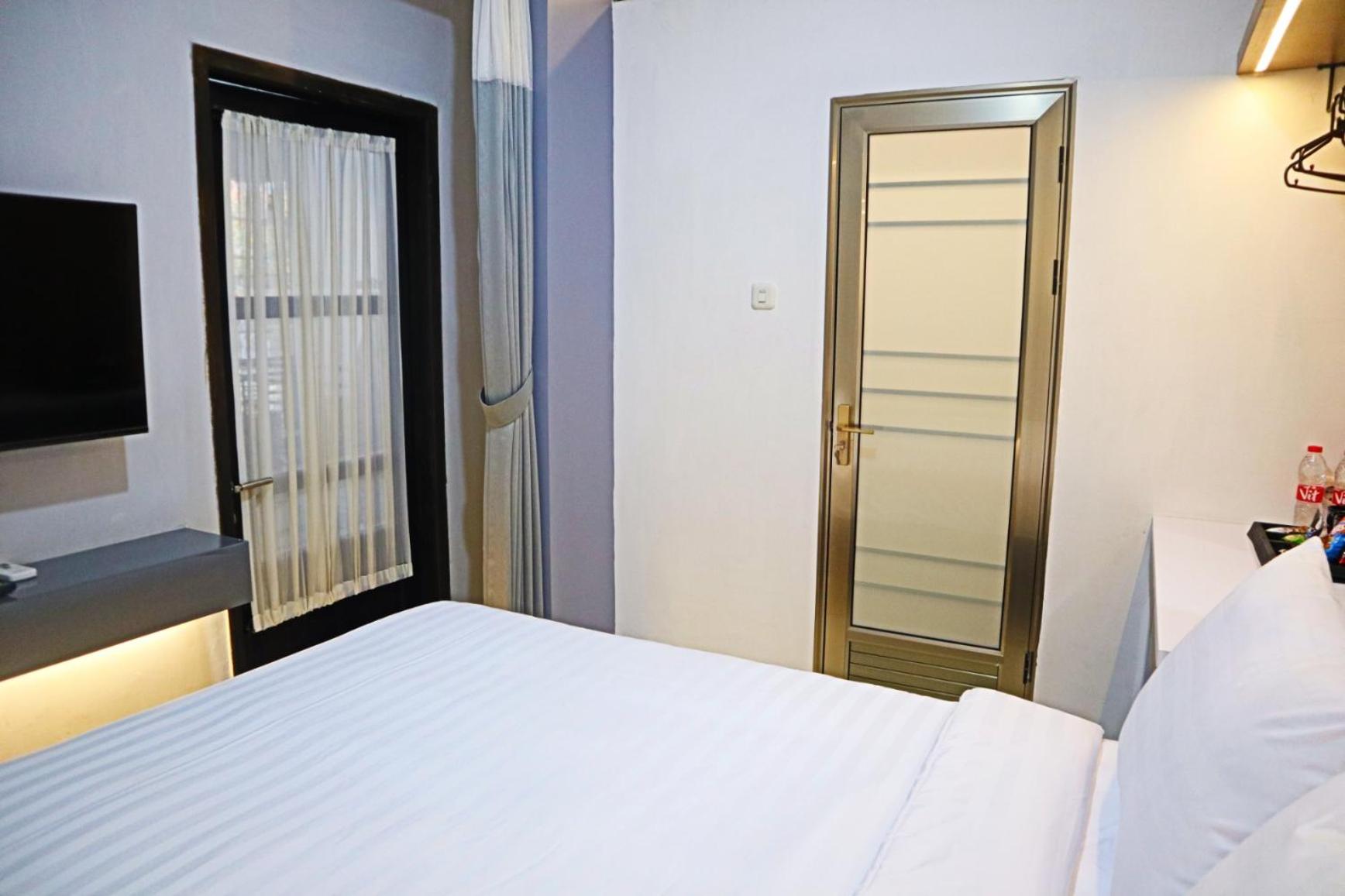 Deluxe Double Room - Photo 14