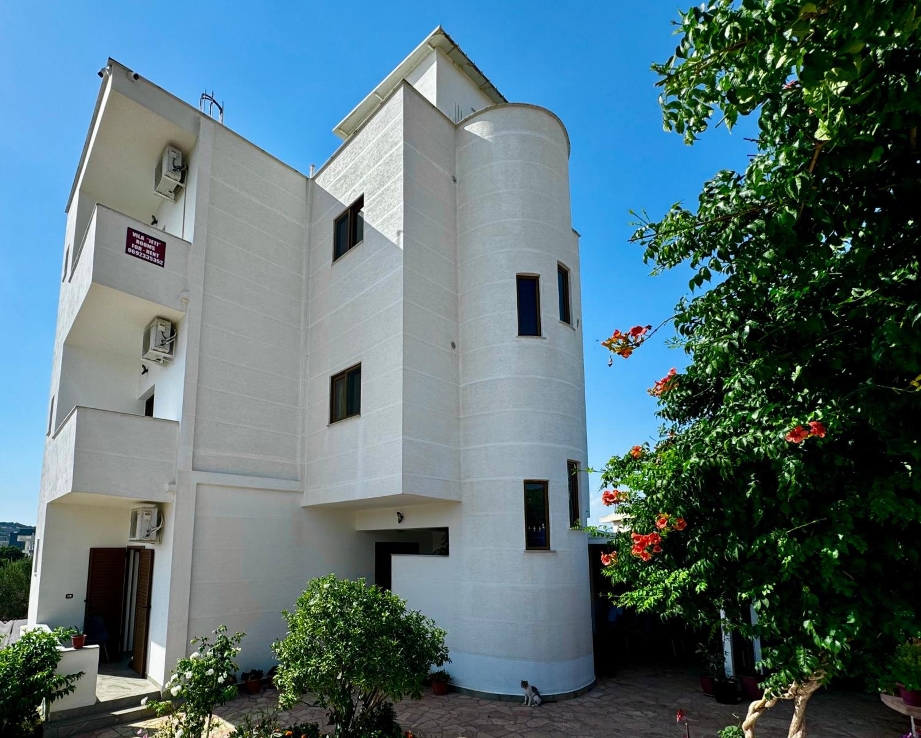 Four-Bedroom Apartment with Balcony 