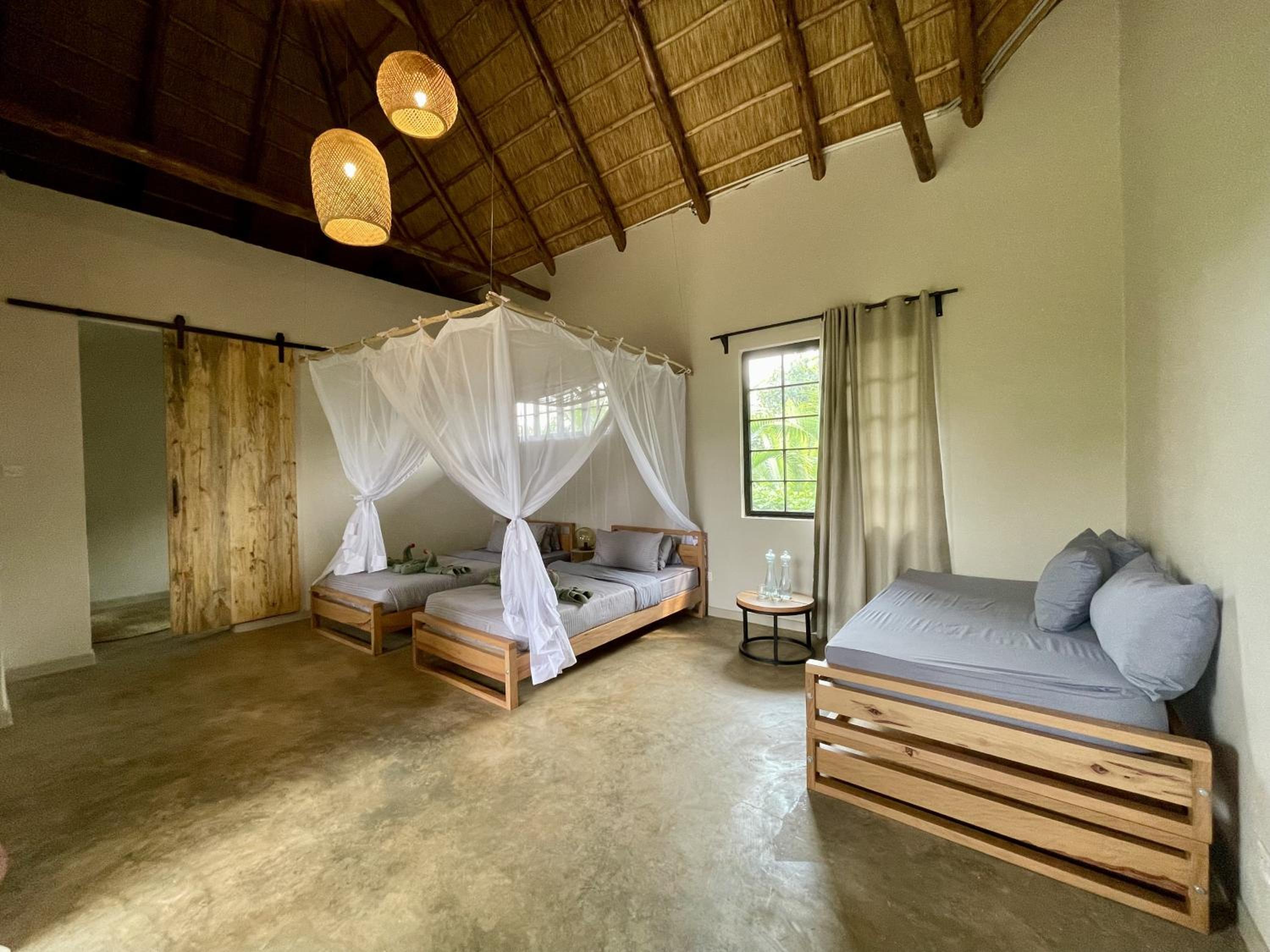 Deluxe Double Room (2 Adults + 1 Child) photo 2