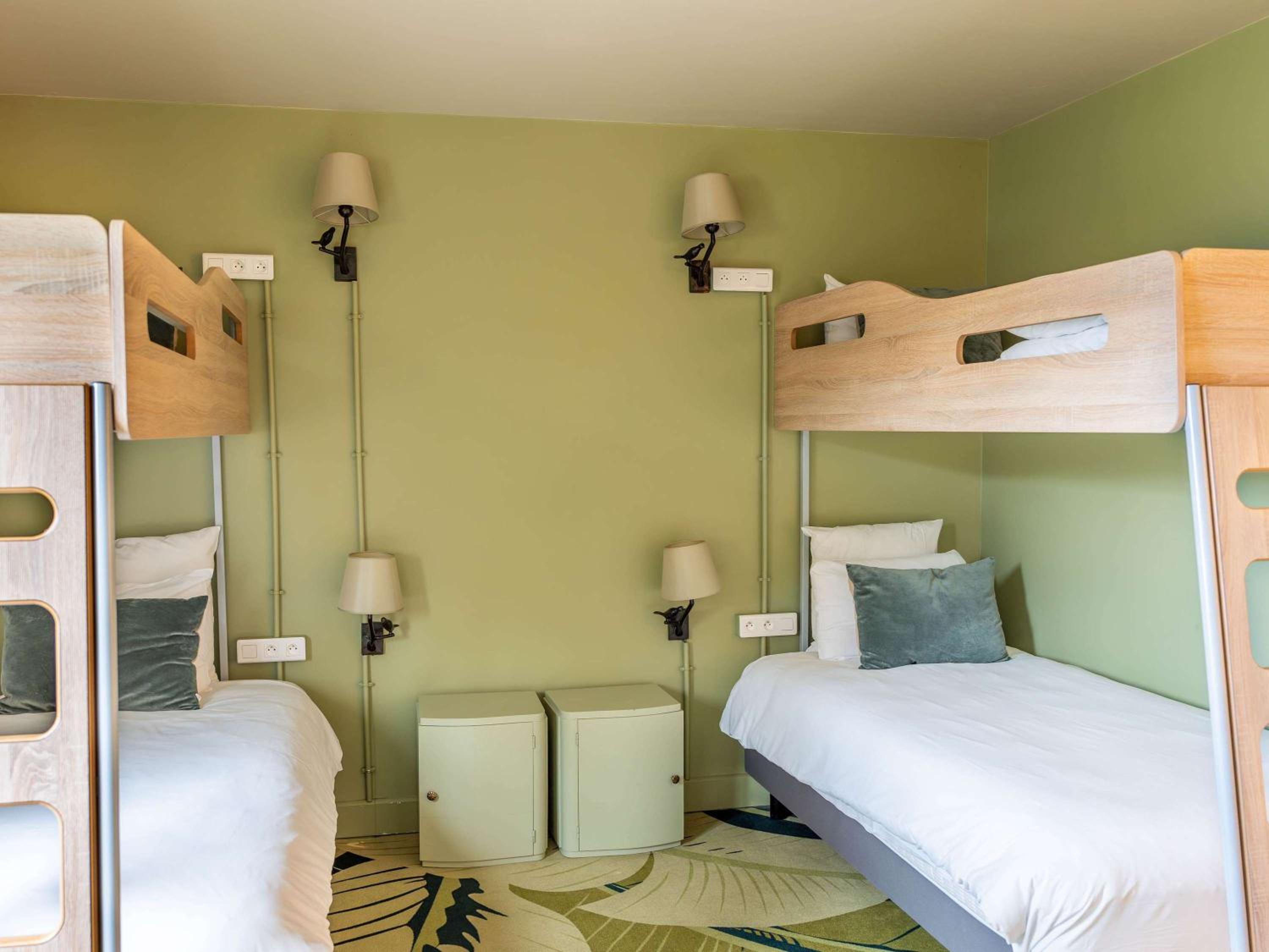 Tribe Room - One Double Bed and 4 Single Beds.