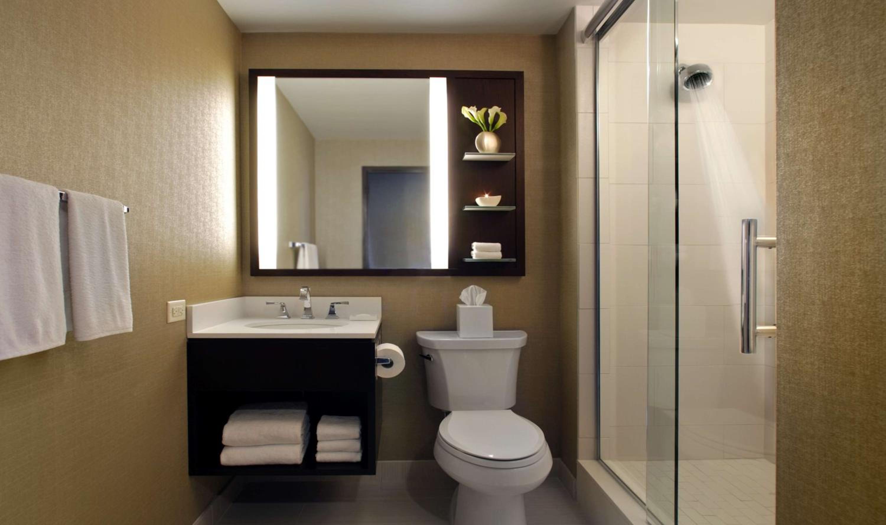 Experience modern comfort in our stylish bathroom retreats.