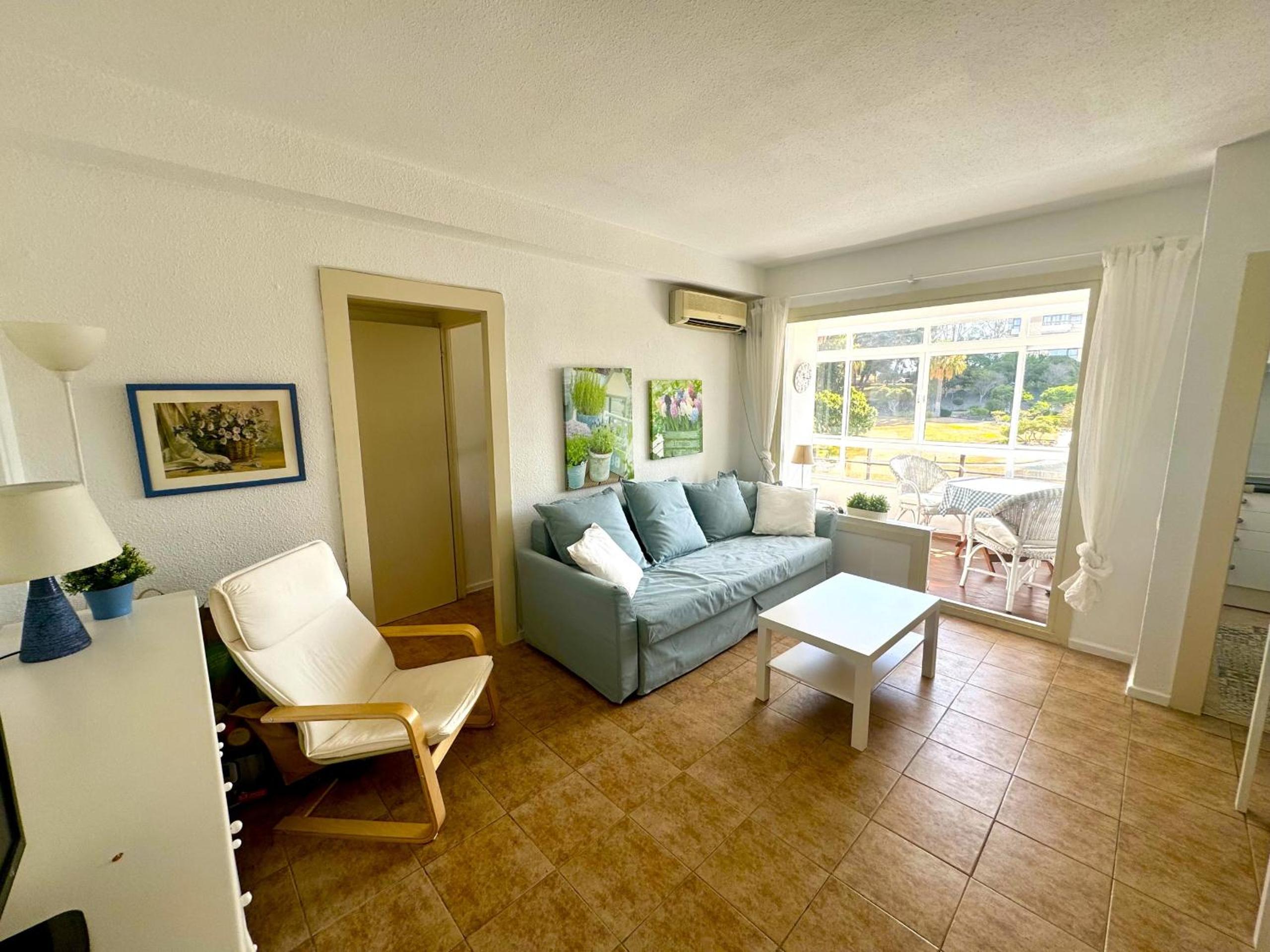 Apartamento con vista al jardín