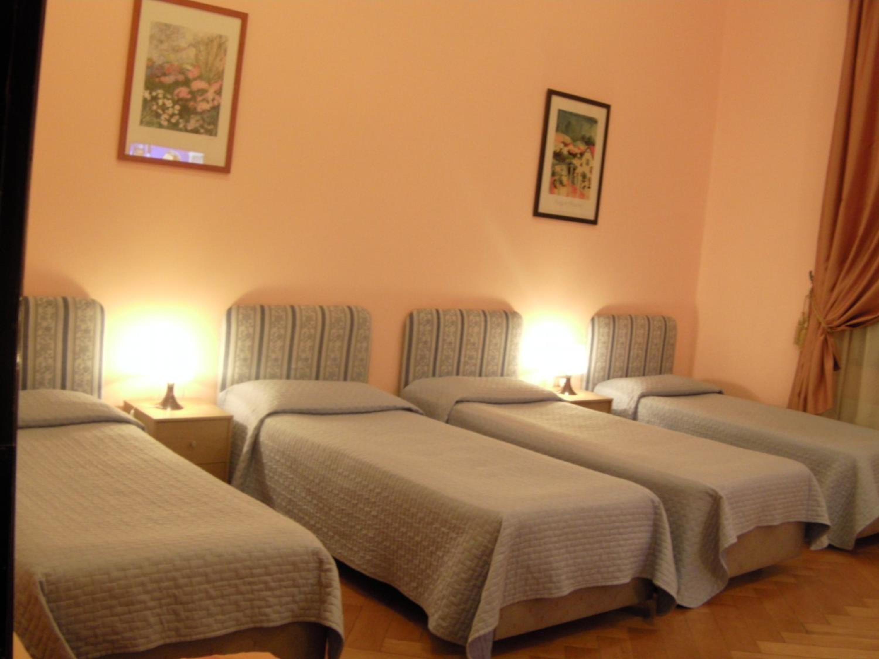 Quadruple Room with Shared Bathroom