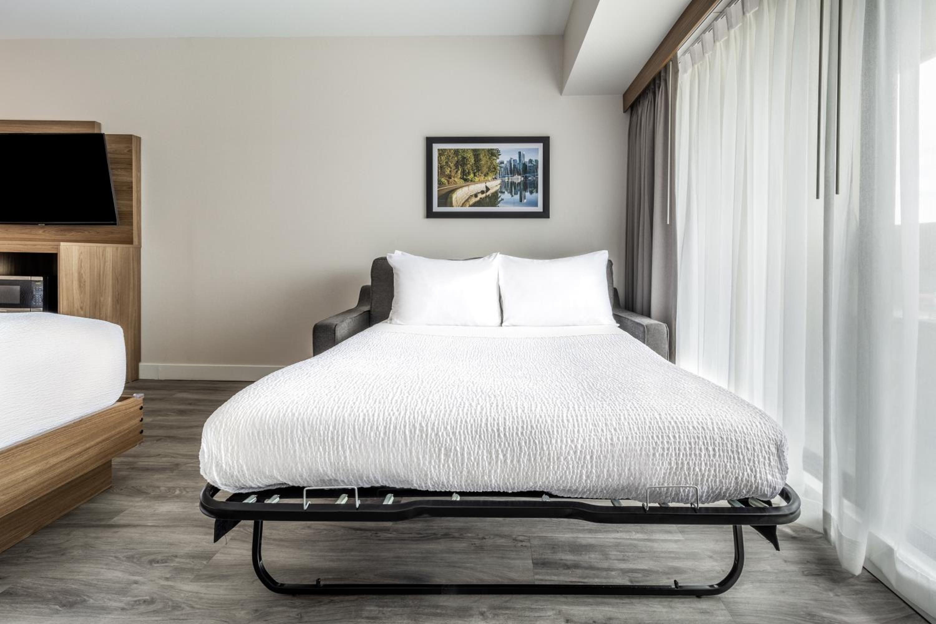 Two Queen beds w/Sofa Bed - Photo 7