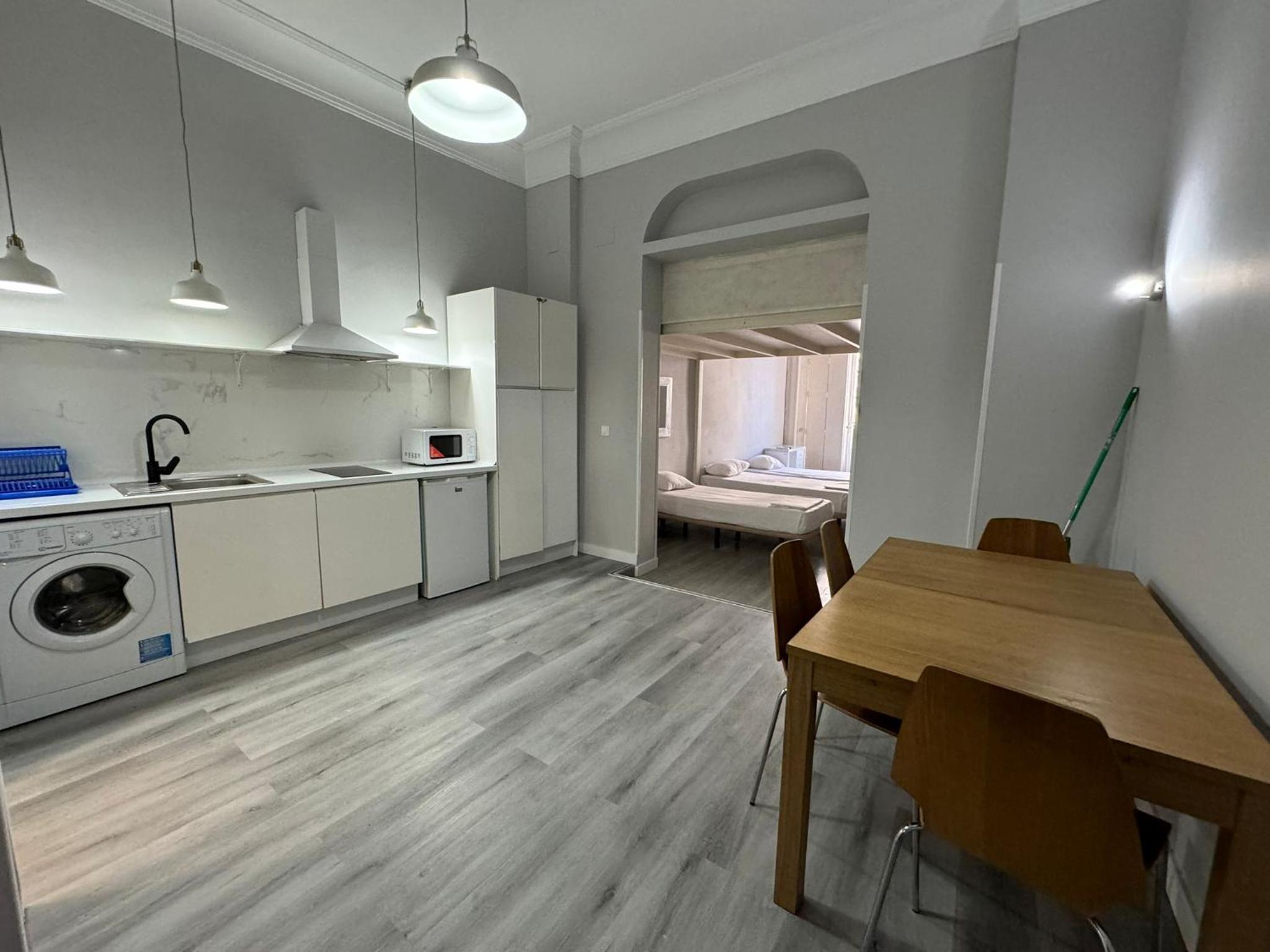 Apartment with Balcony - Photo 7