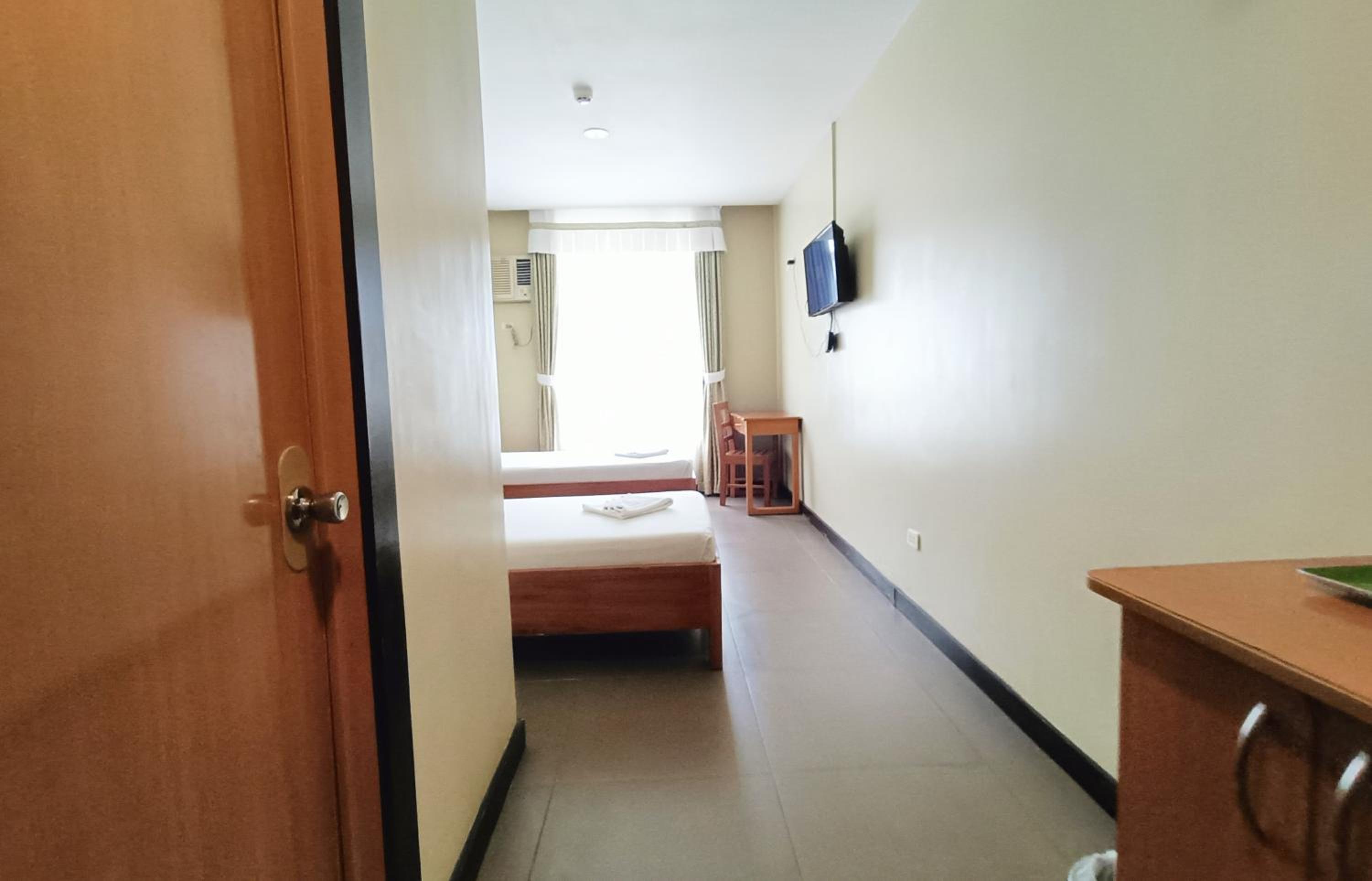 Standard Twin Room - Photo 11