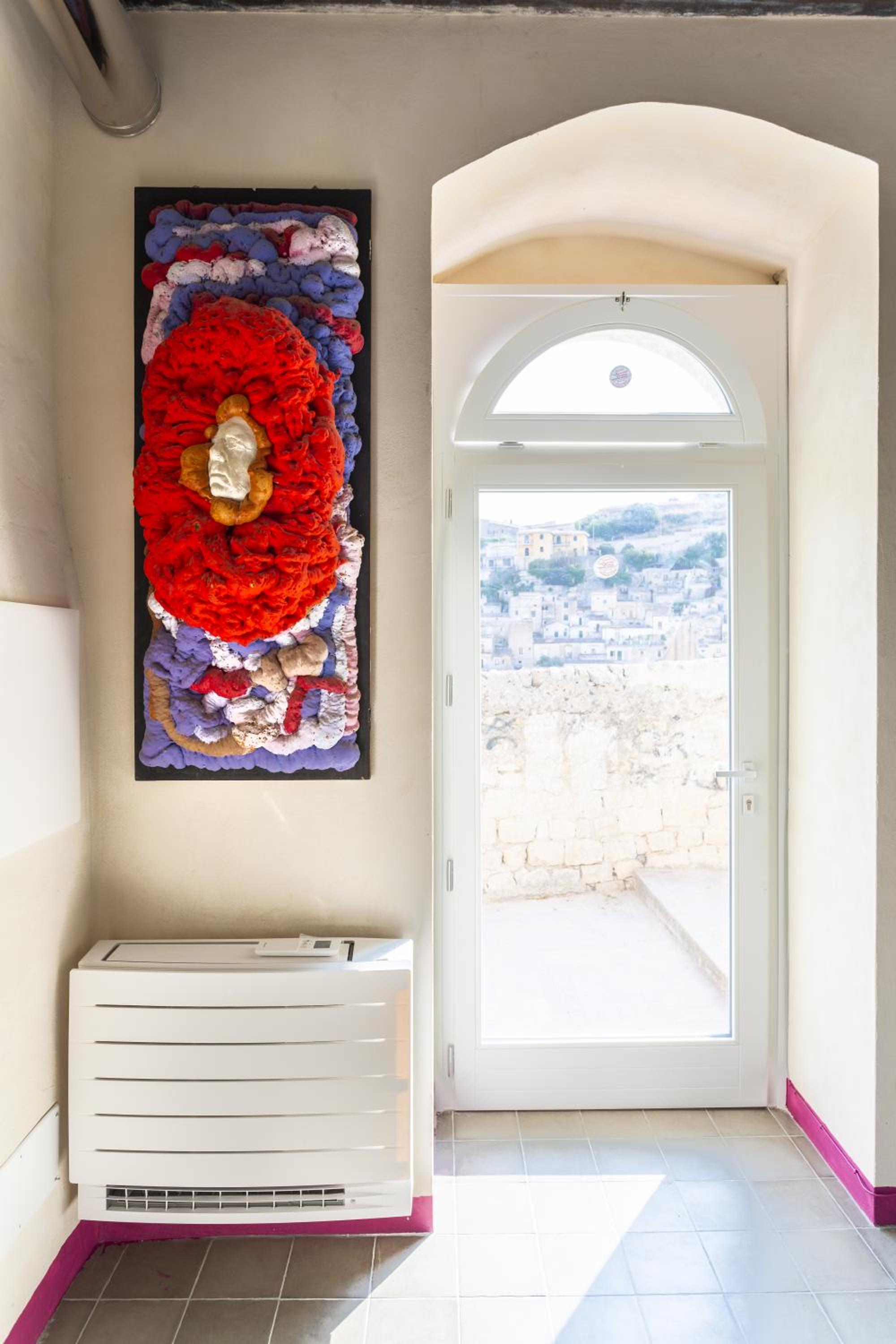 One-Bedroom Apartment with Balcony and City View photo 2