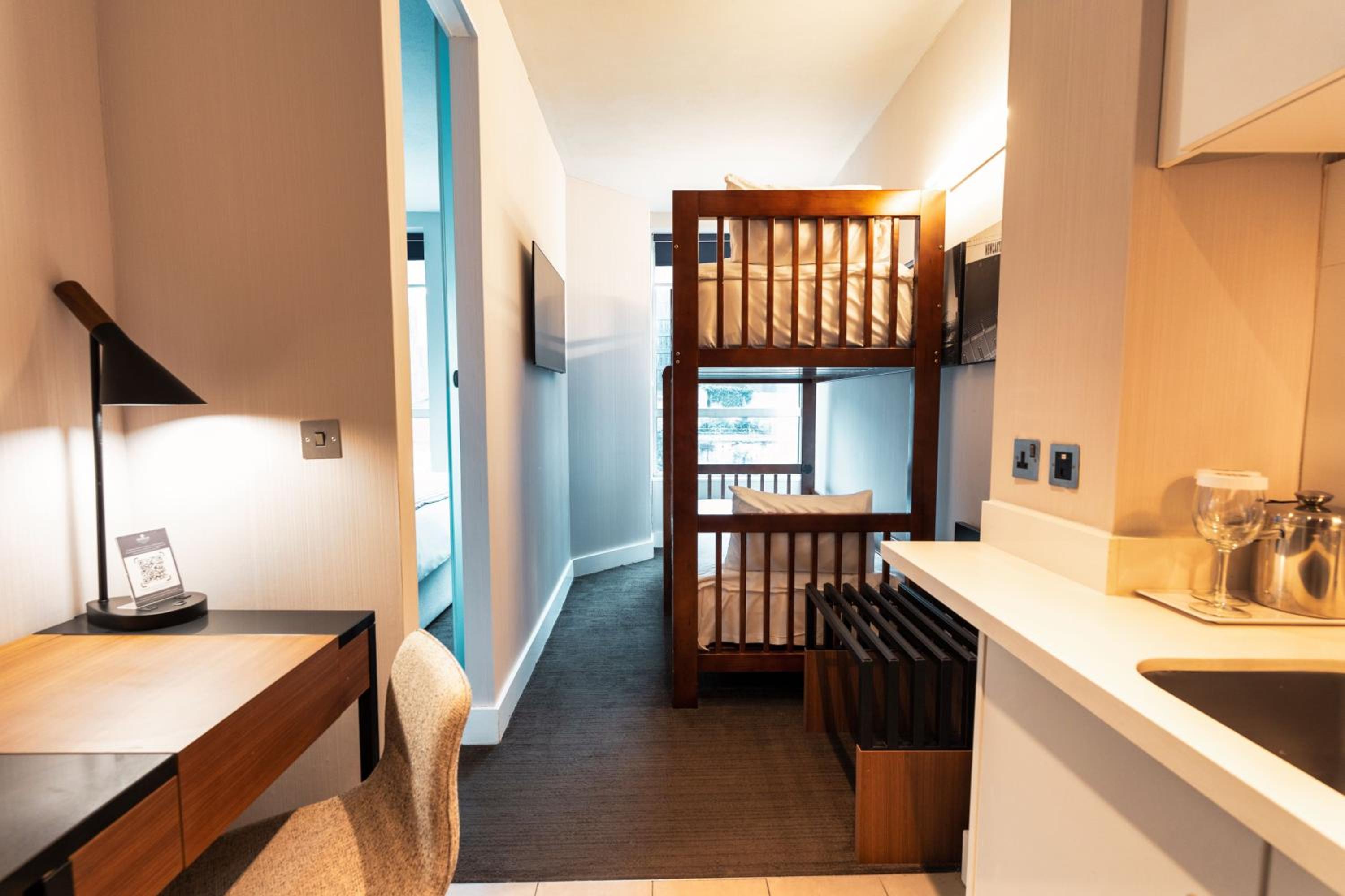 Family Suite, 1 King Bed, Bunk Beds, Kitchenette - Photo 3