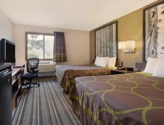 Queen Room with Two Queen Beds - Non-Smoking - Photo 1