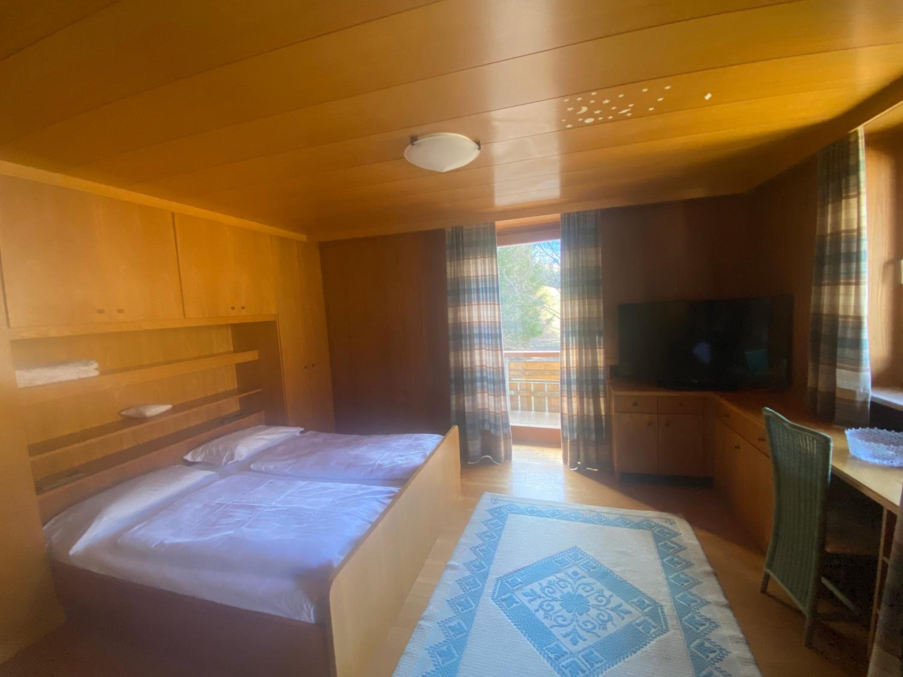 Four-Bedroom Apartment with Balcony
