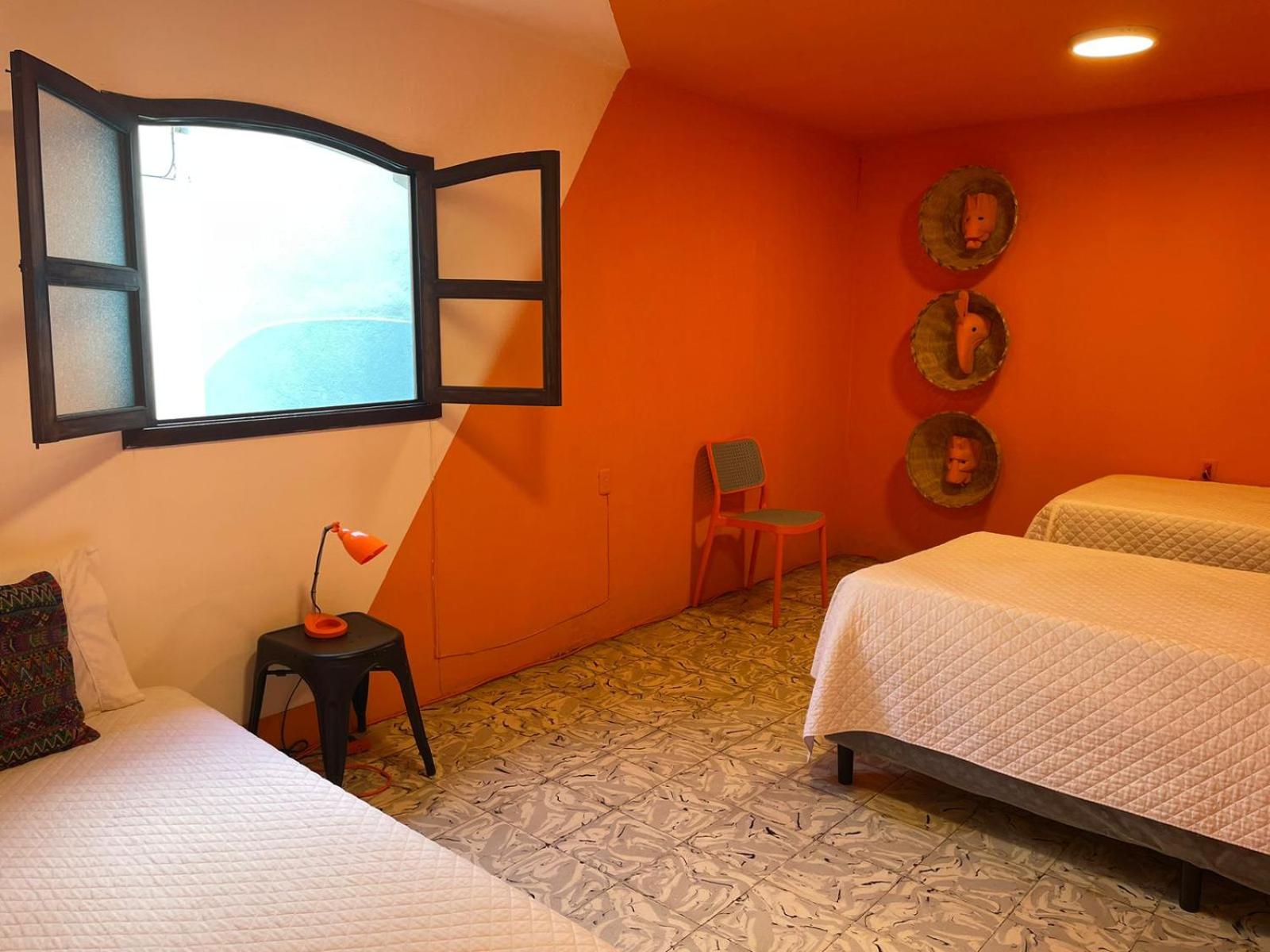 Basic Triple Room with Shared Bathroom - Photo 1