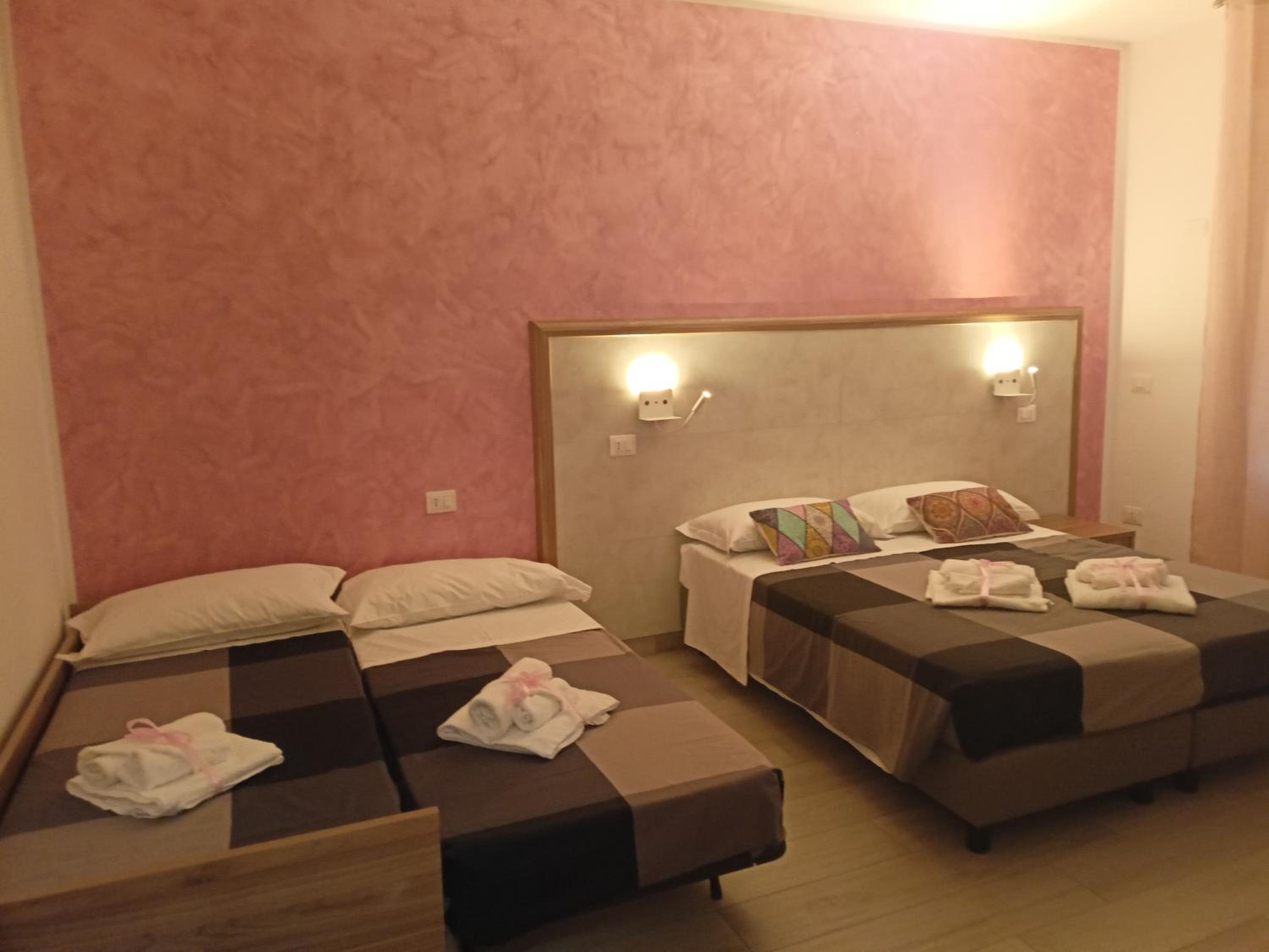 Deluxe Quadruple Room with Private Bathroom