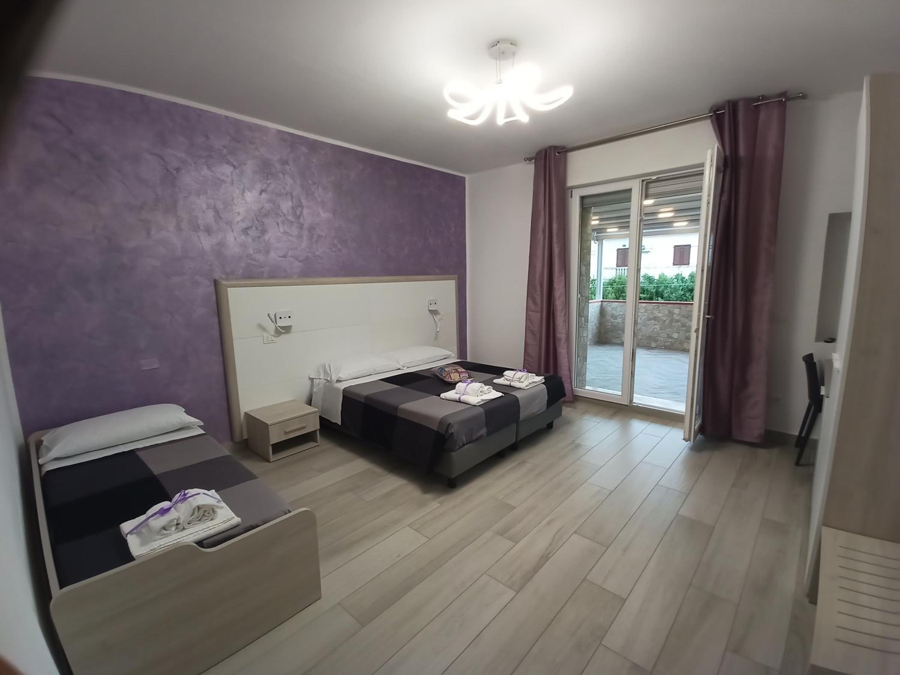 Quadruple Room with Terrace and Private Bathroom