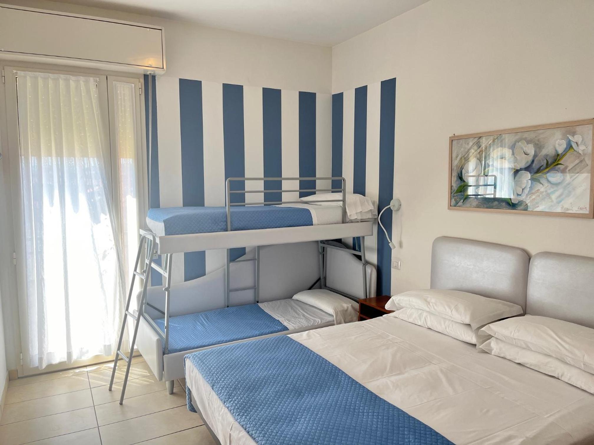 Standard Quadruple room with balcony