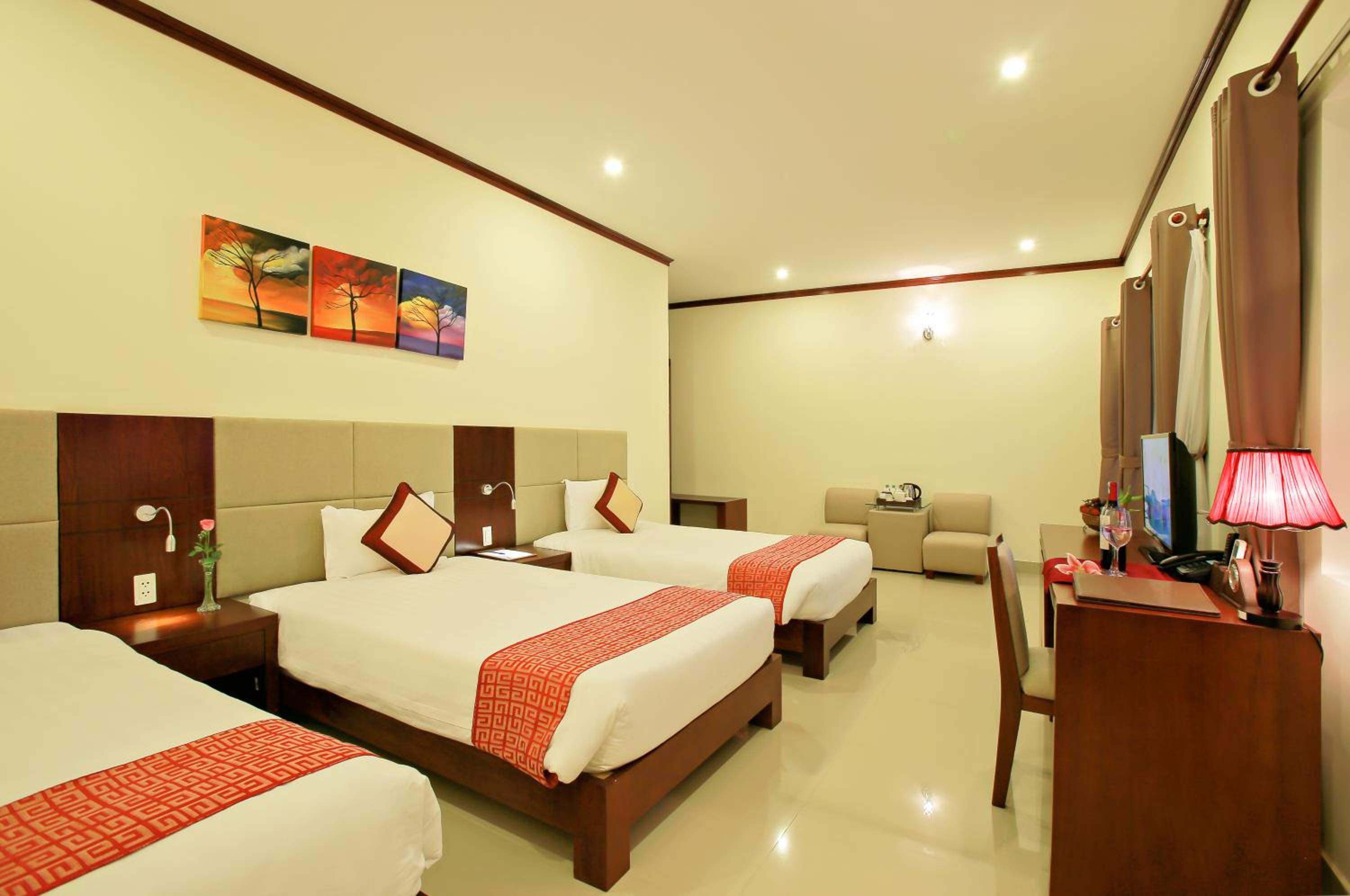 Deluxe Triple Room - Photo 1