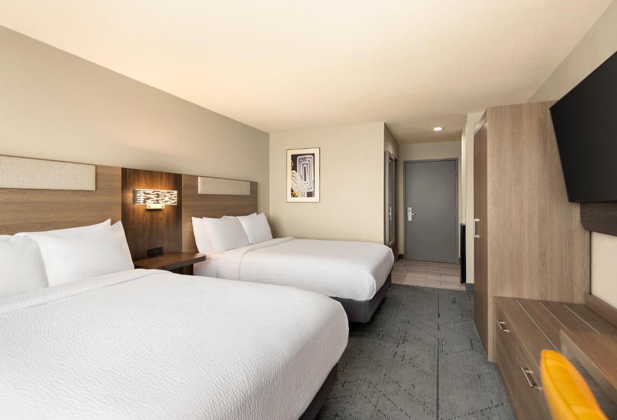 Standard Queen Room with Two Queen Beds - Photo 1