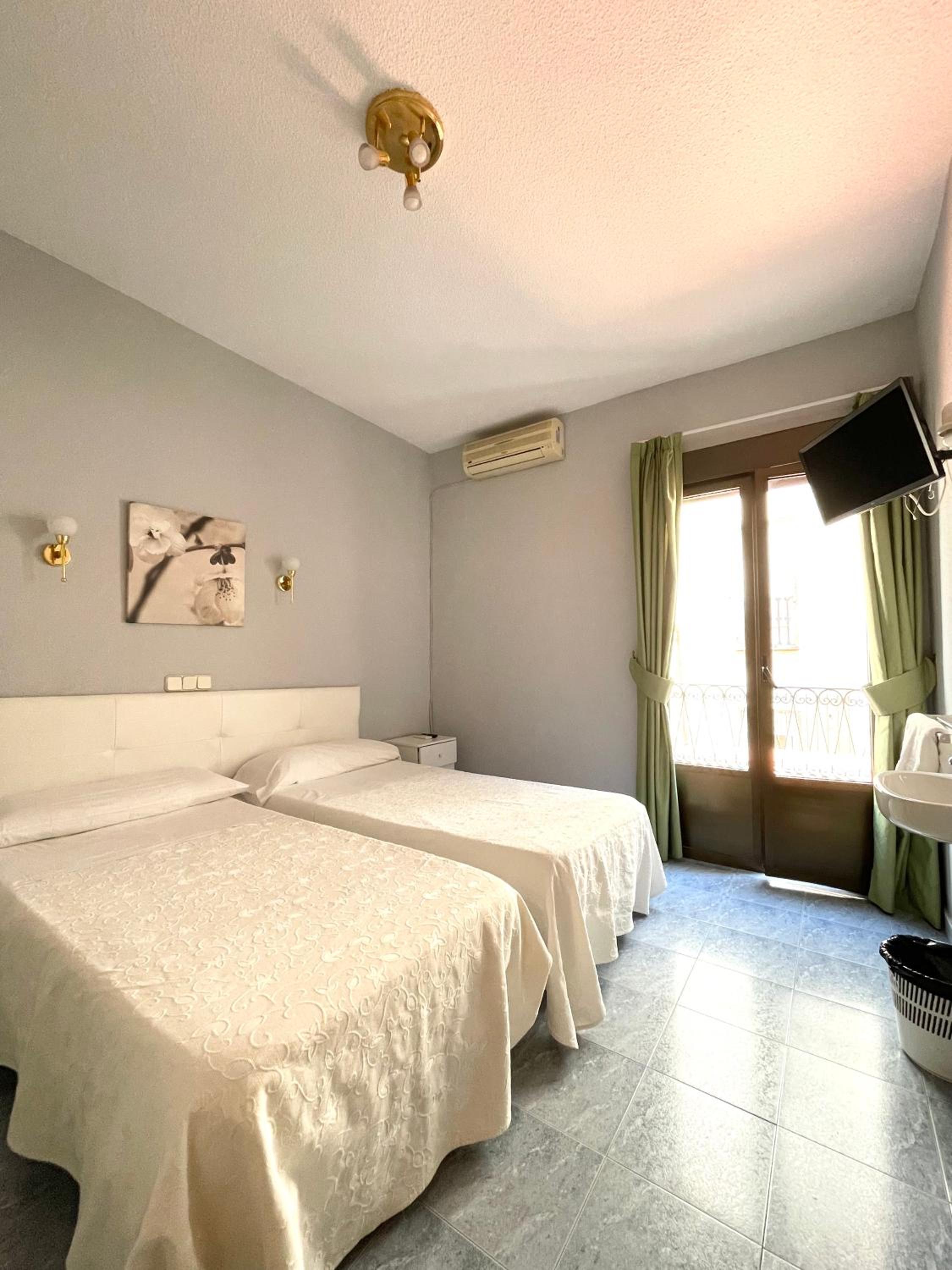 Habitación Doble con Baño Compartido