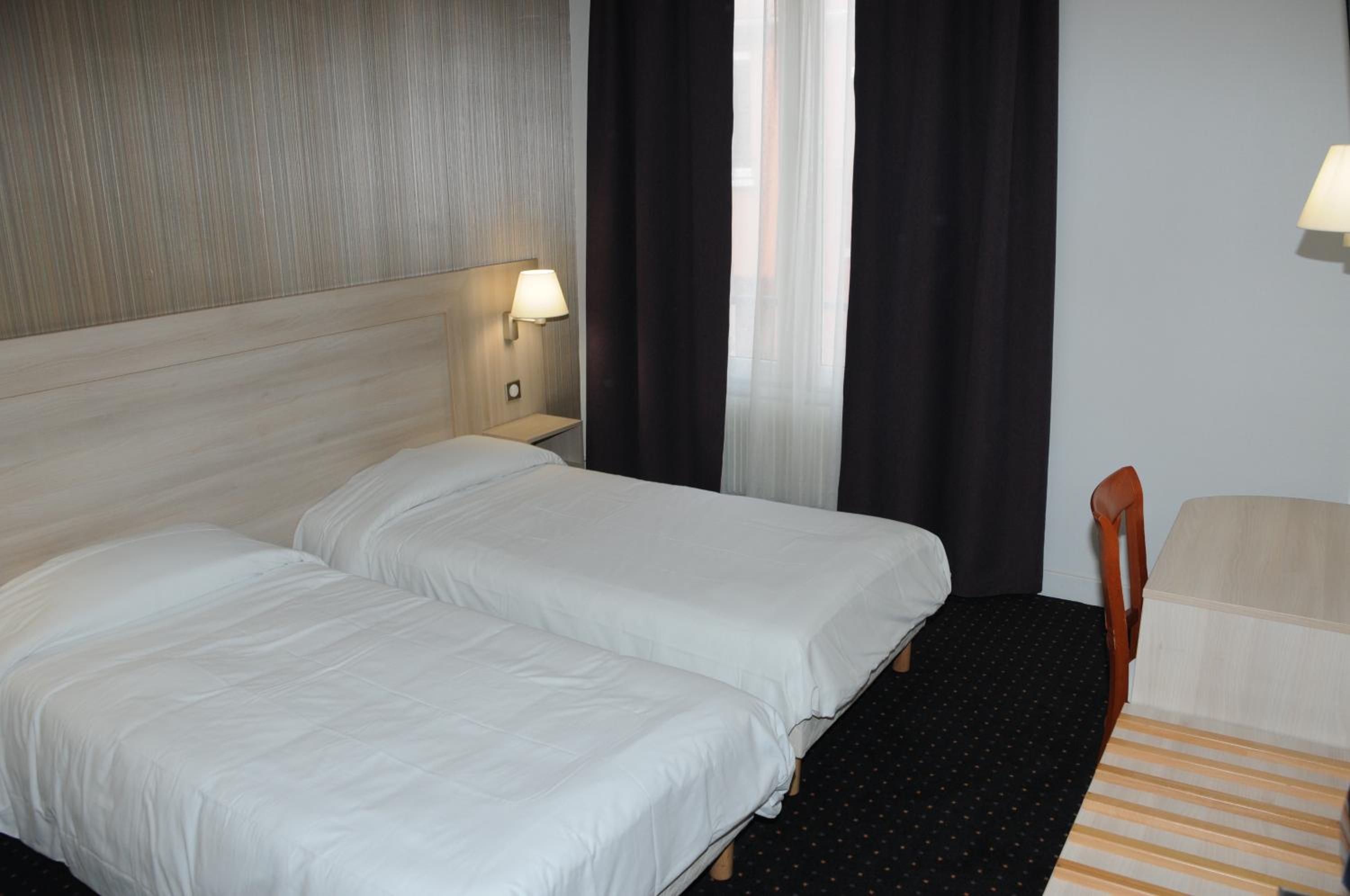 Twin Room - Photo 1