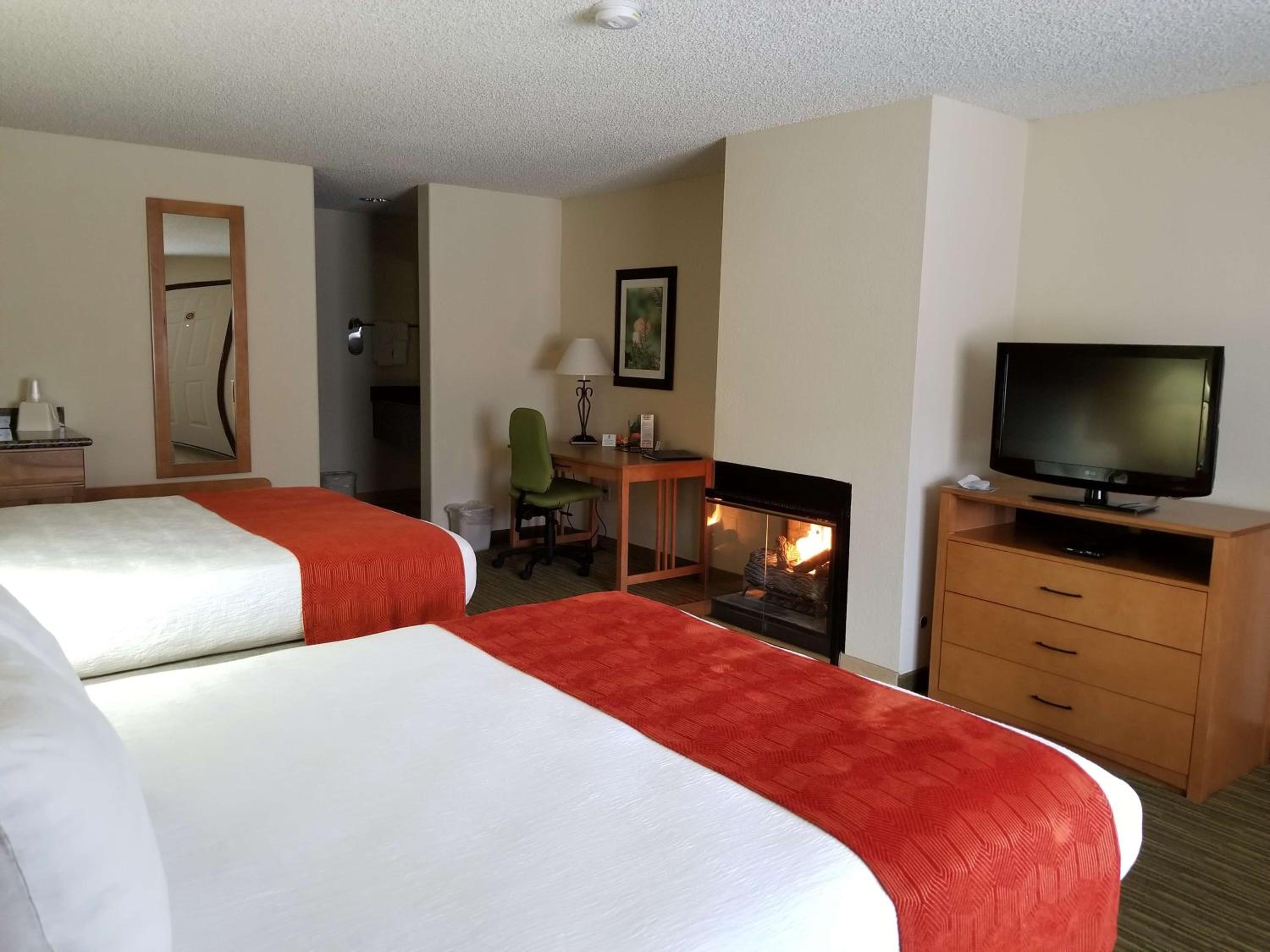 Queen Room with Two Queen Beds and Fireplace - Non-Smoking photo 1