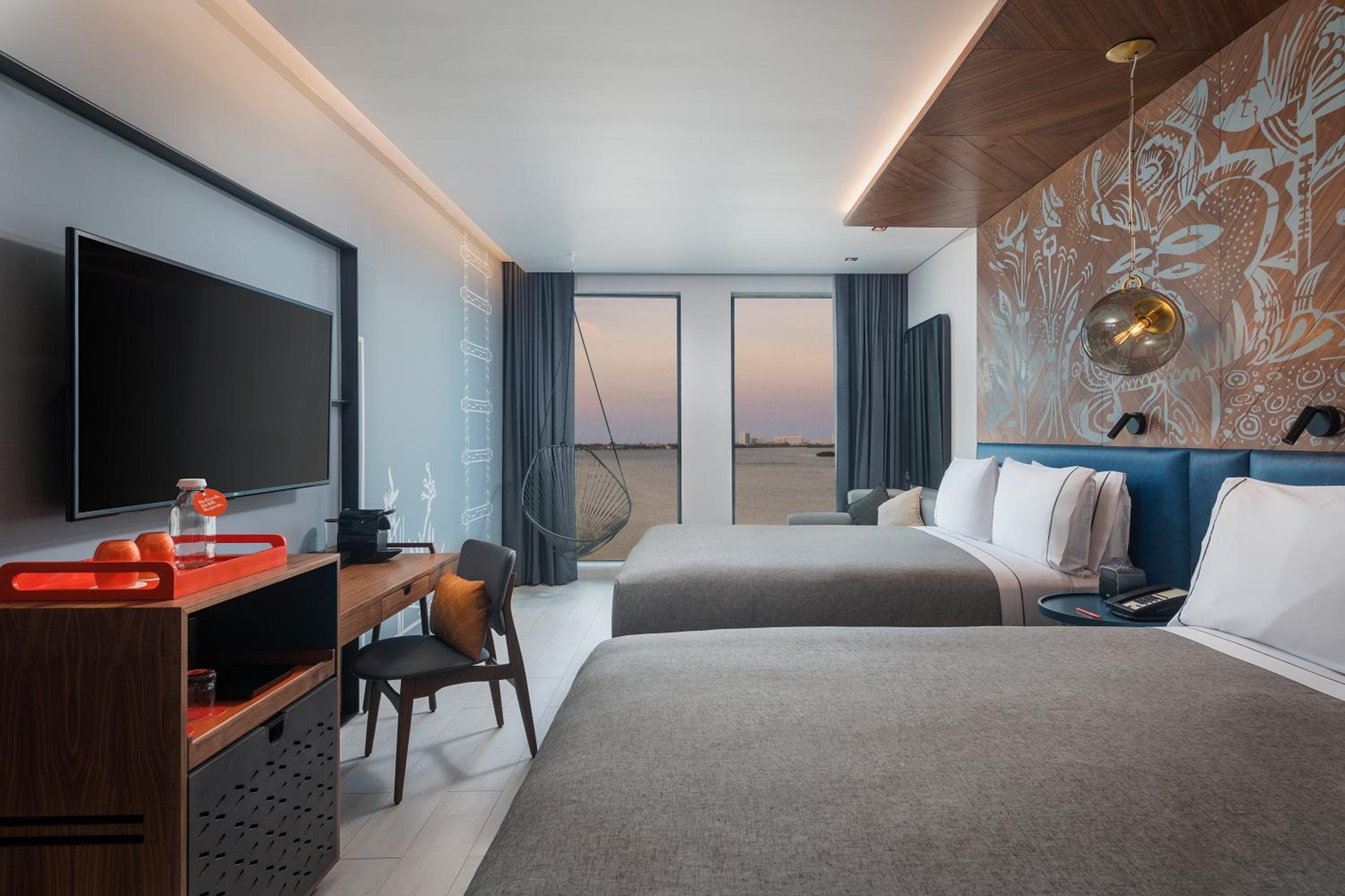 Premium Queen Room with Two Queen Beds and Sunset Bay View