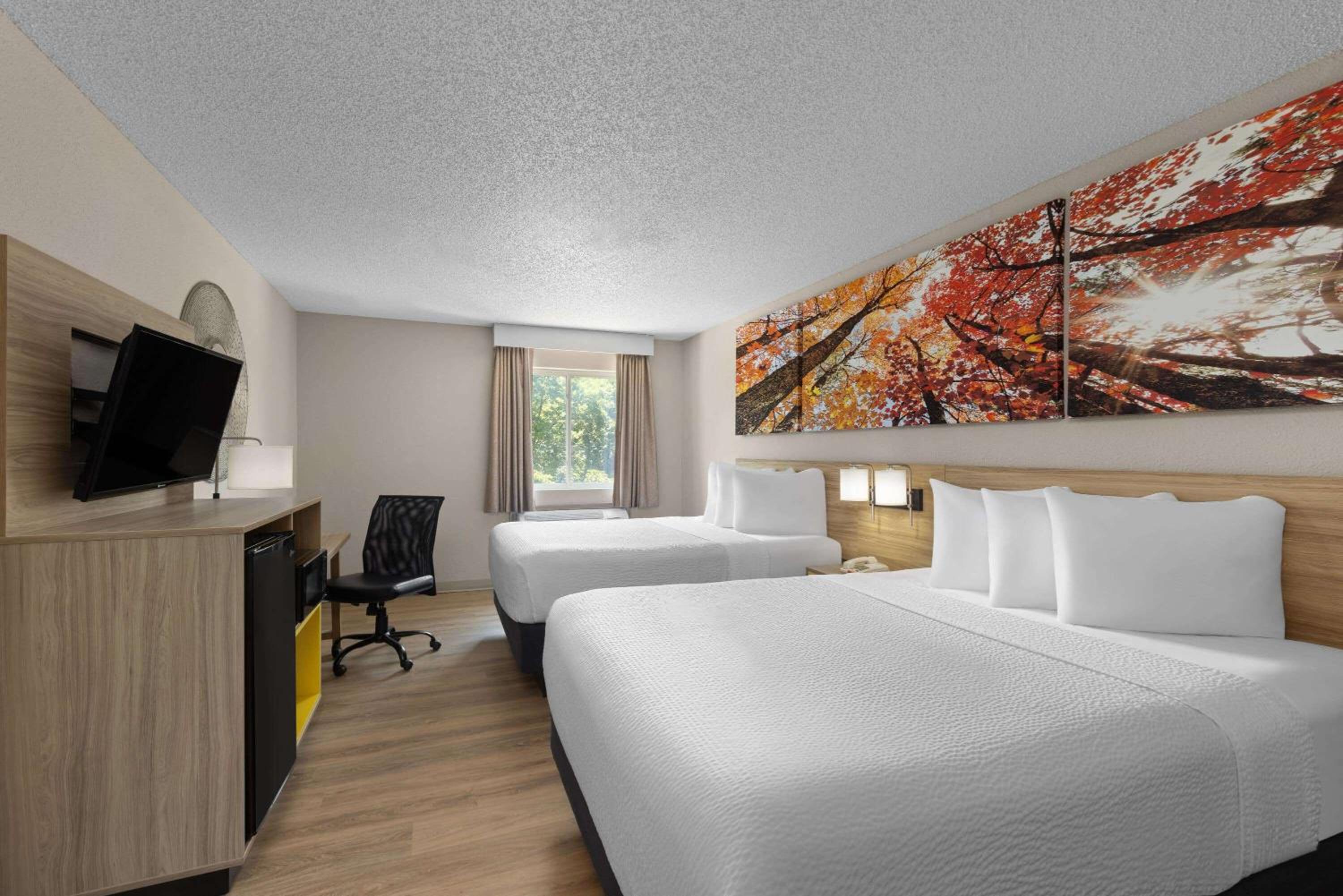 Deluxe Queen Room with Two Queen Beds - Non-Smoking - Photo 1