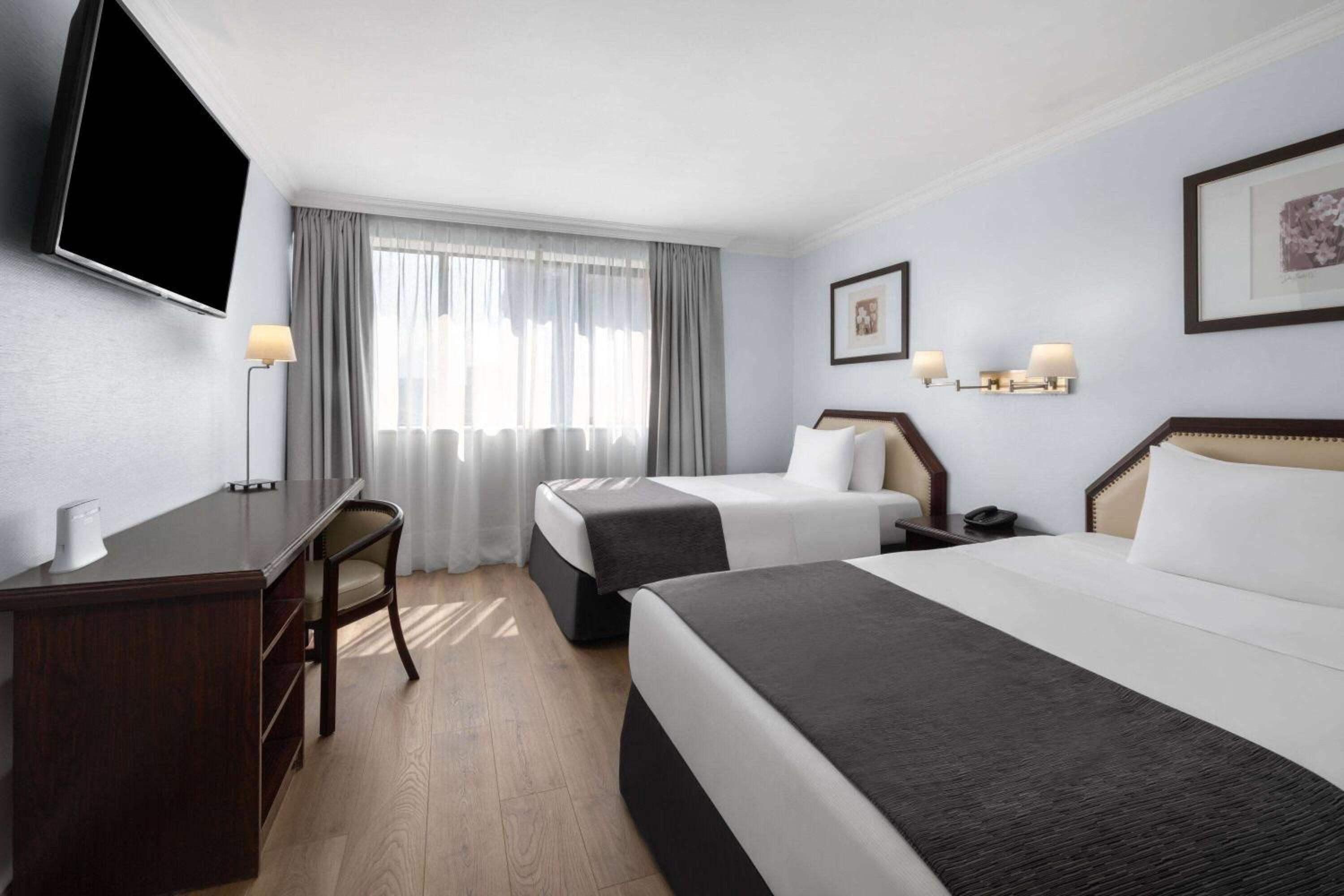 Standard Queen Room with Two Queen Beds, Non-Smoking photo 1