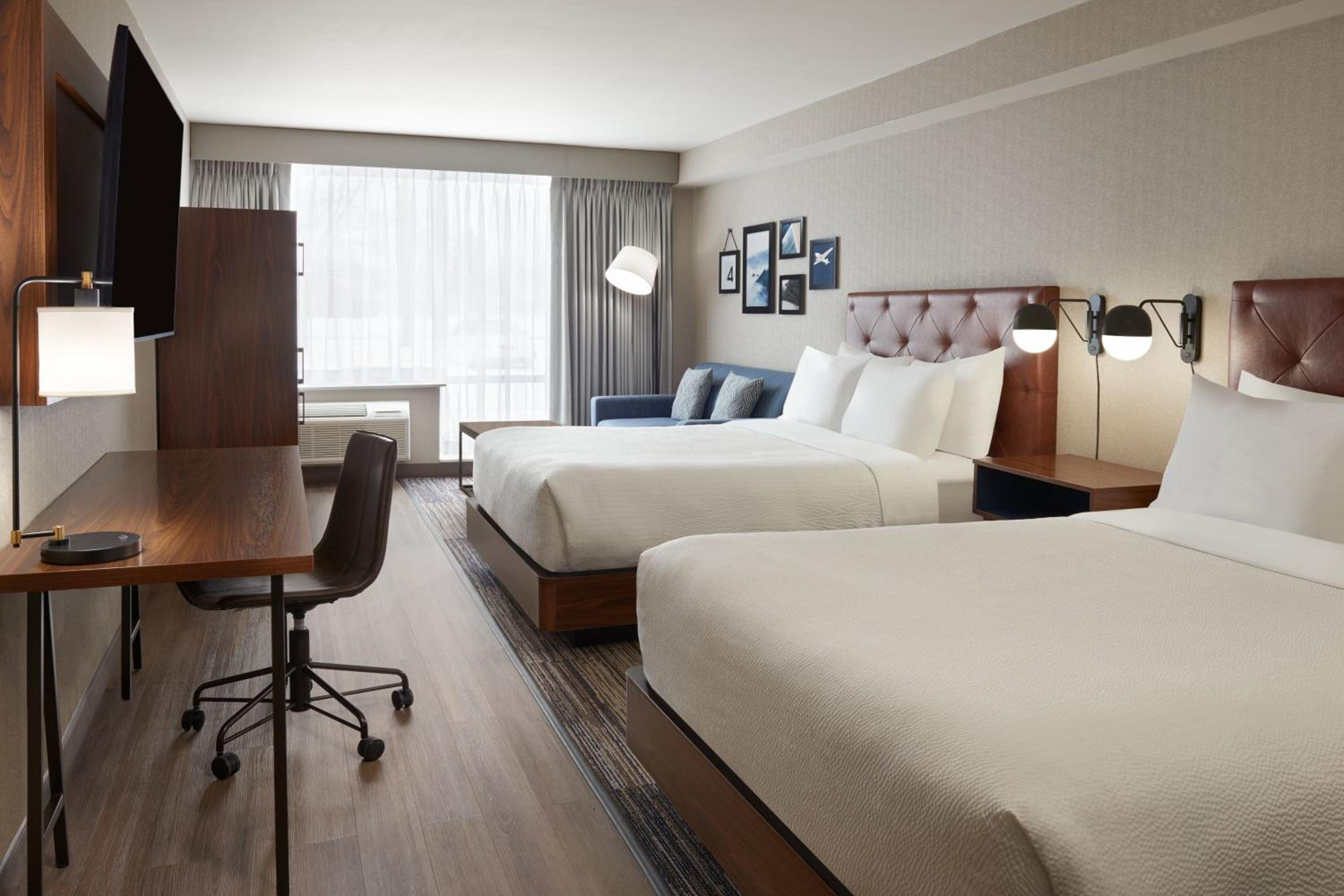 Deluxe Queen Room with Two Queen Beds - Photo 2
